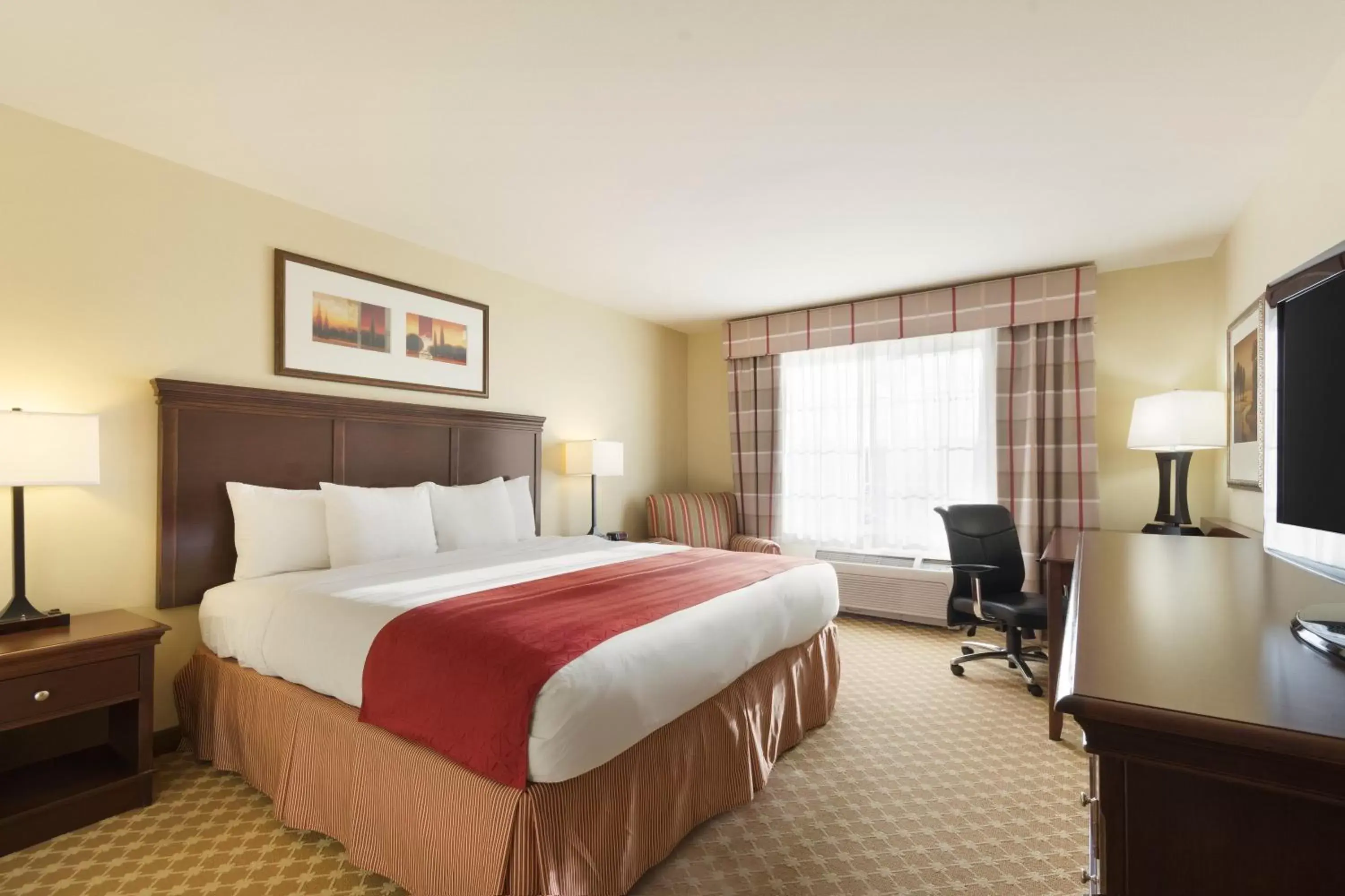 Bed in Country Inn & Suites by Radisson, Covington, LA