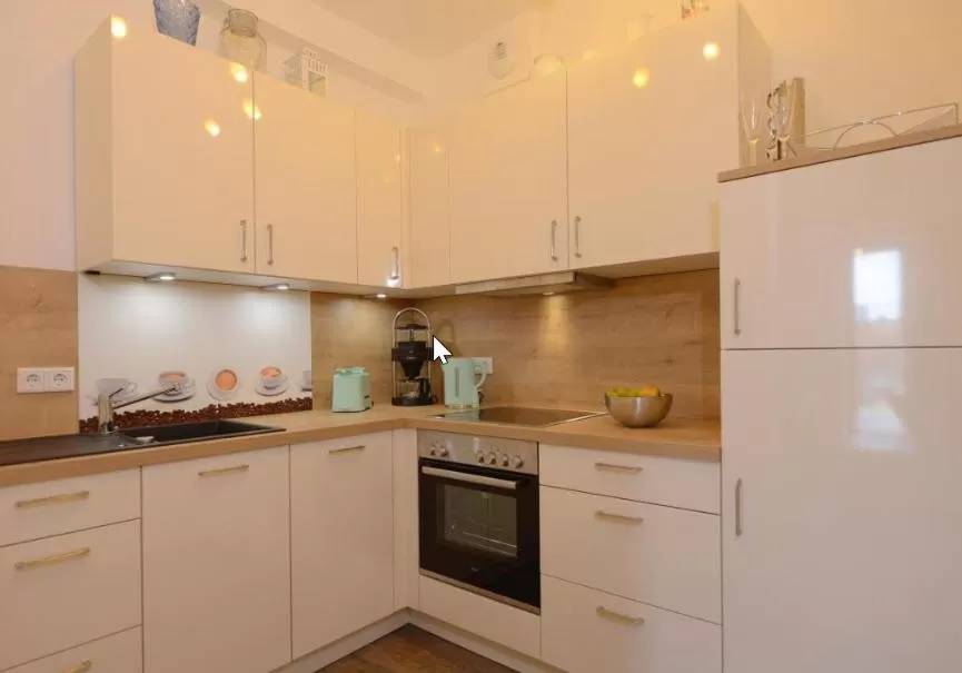 Photo of the whole room, Kitchen/Kitchenette in Appartment Ferienwohnung mit großer Terrasse Ohlerich Speicher Wismar