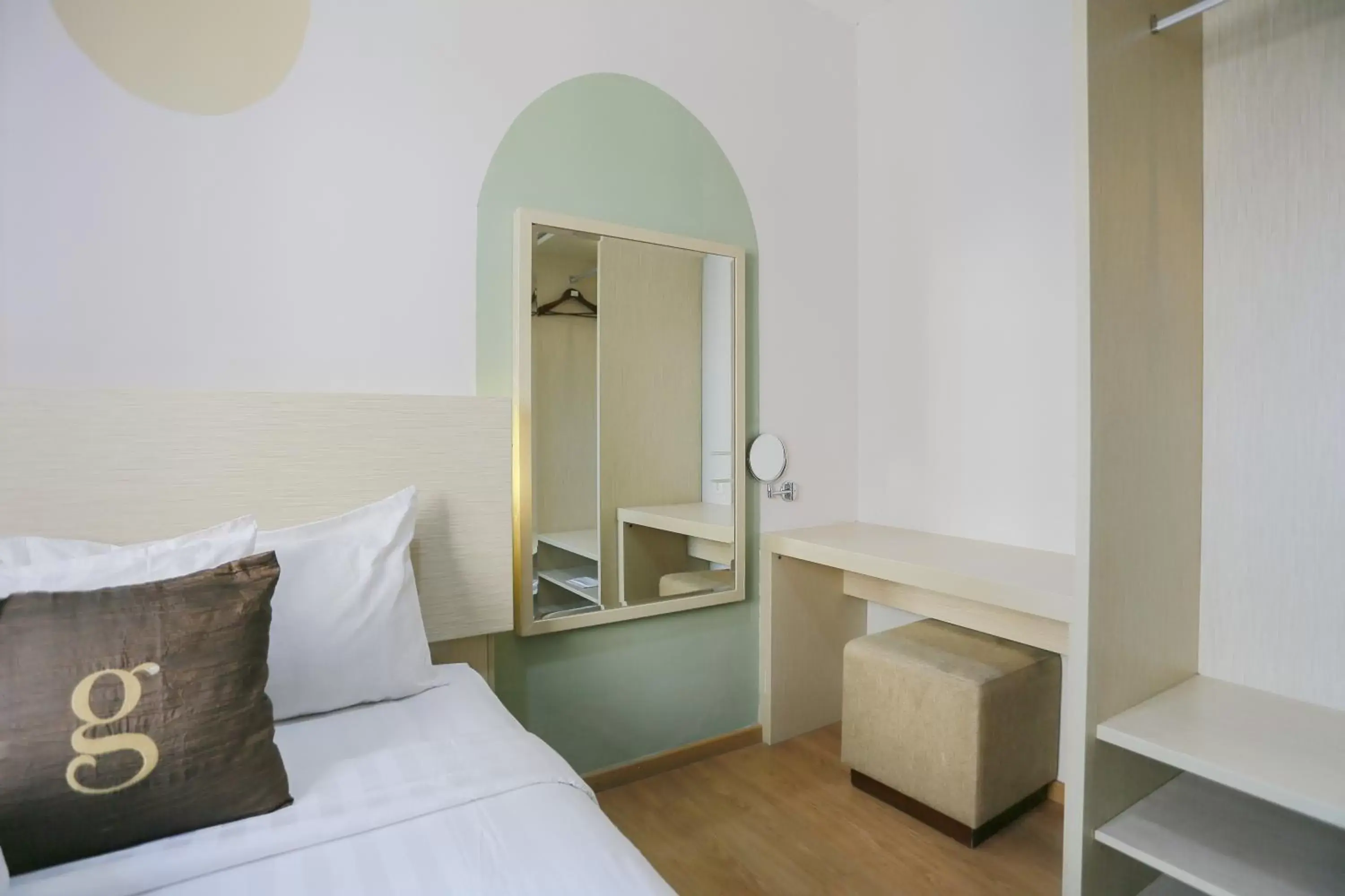 wardrobe, Bed in Hotel Gunawangsa Manyar