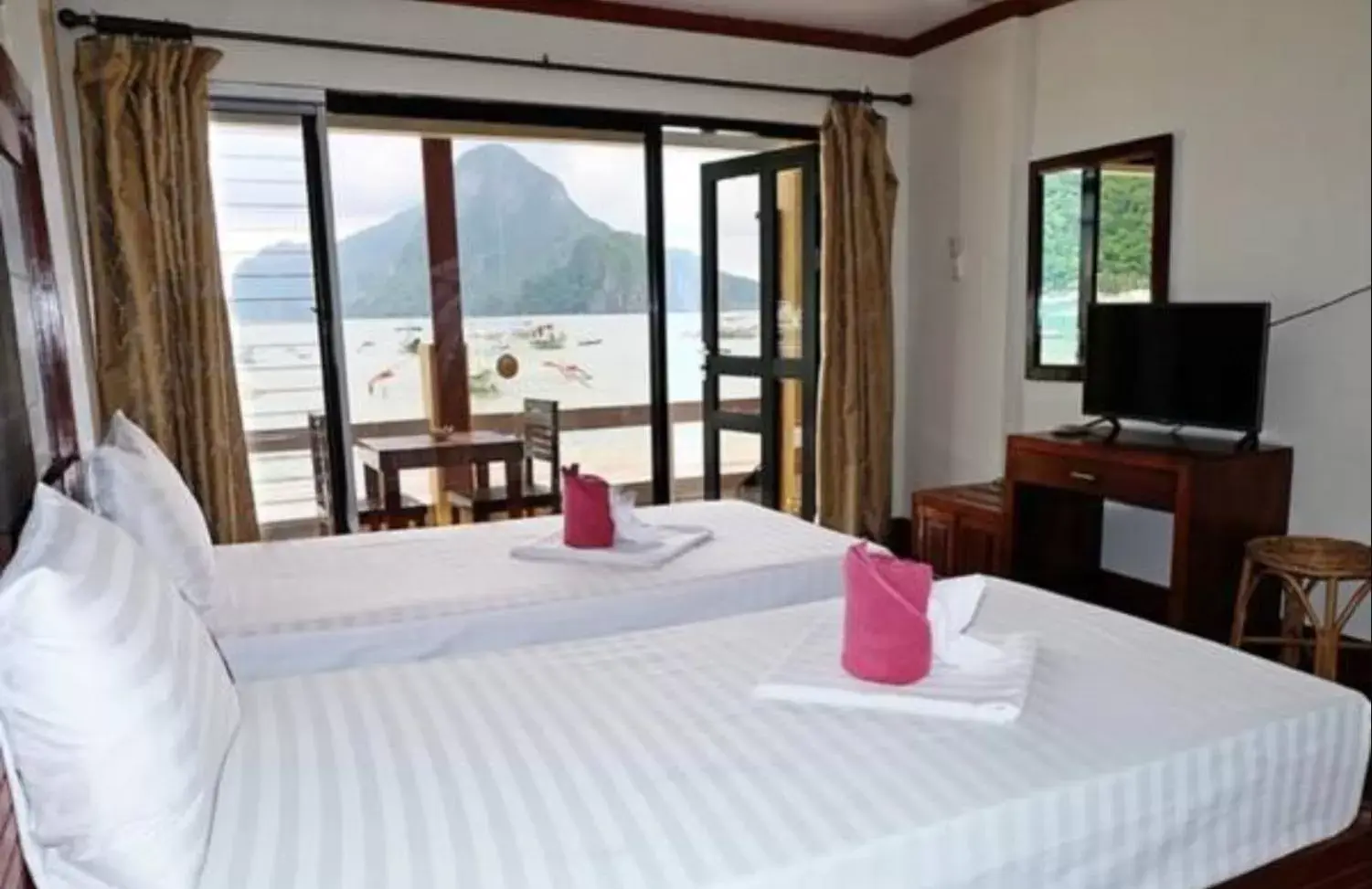 Bed in El Nido Beach Hotel Bed in El Nido Beach Hotel