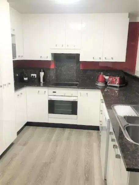 Kitchen/Kitchenette in Sunrise Luxury Apartments