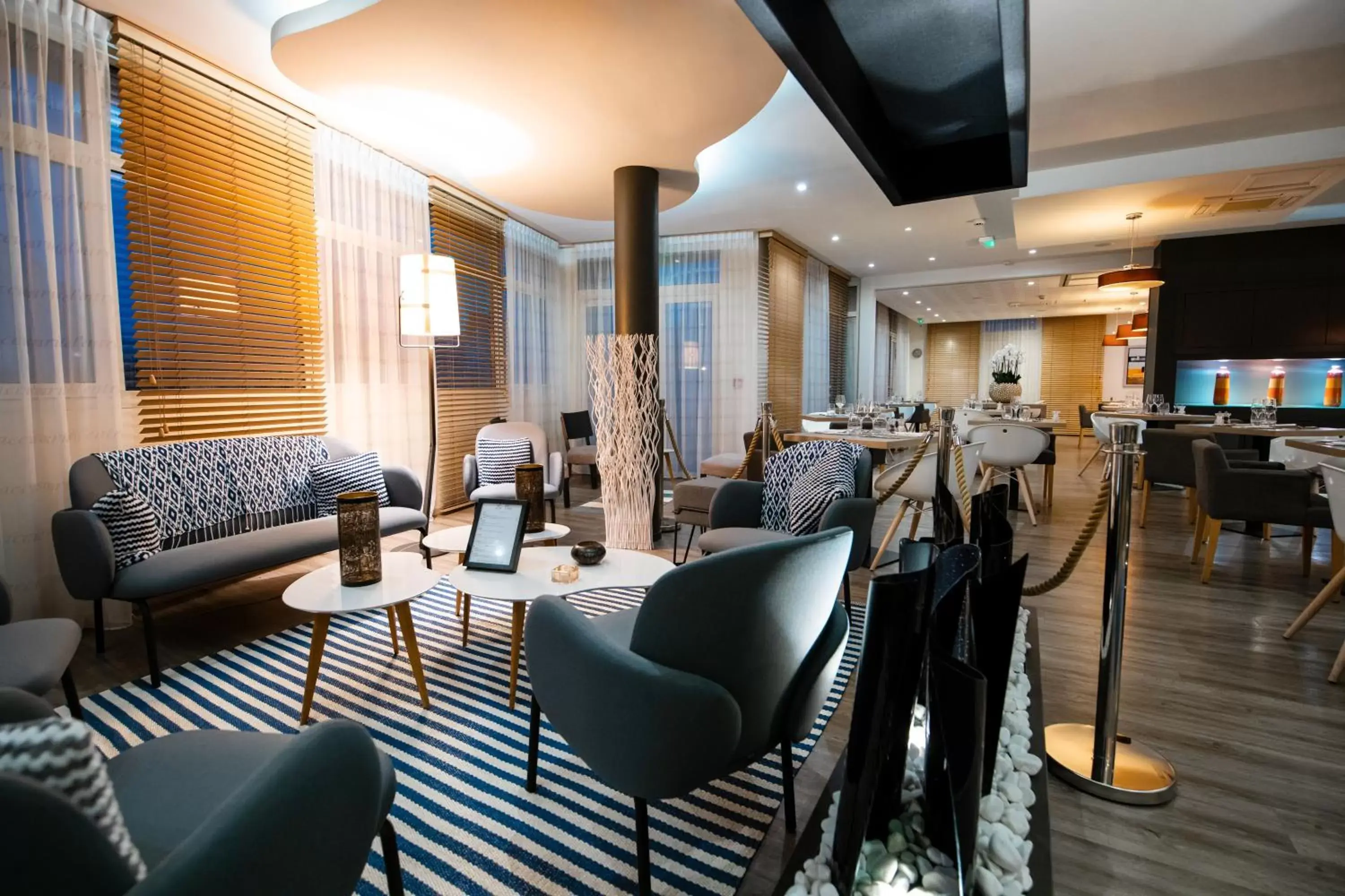 Lounge or bar in Kyriad Prestige Vannes Centre-Palais des Arts