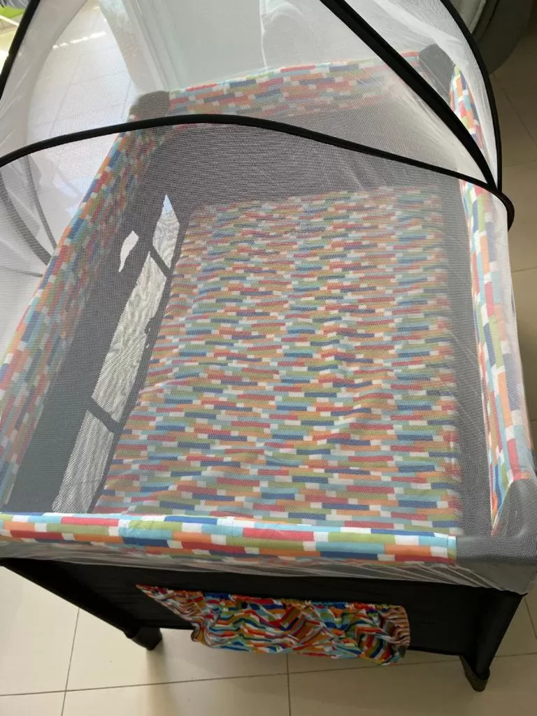 cot in Apartamento no Golden Lake - pé na areia, agua de côco e cervejinha