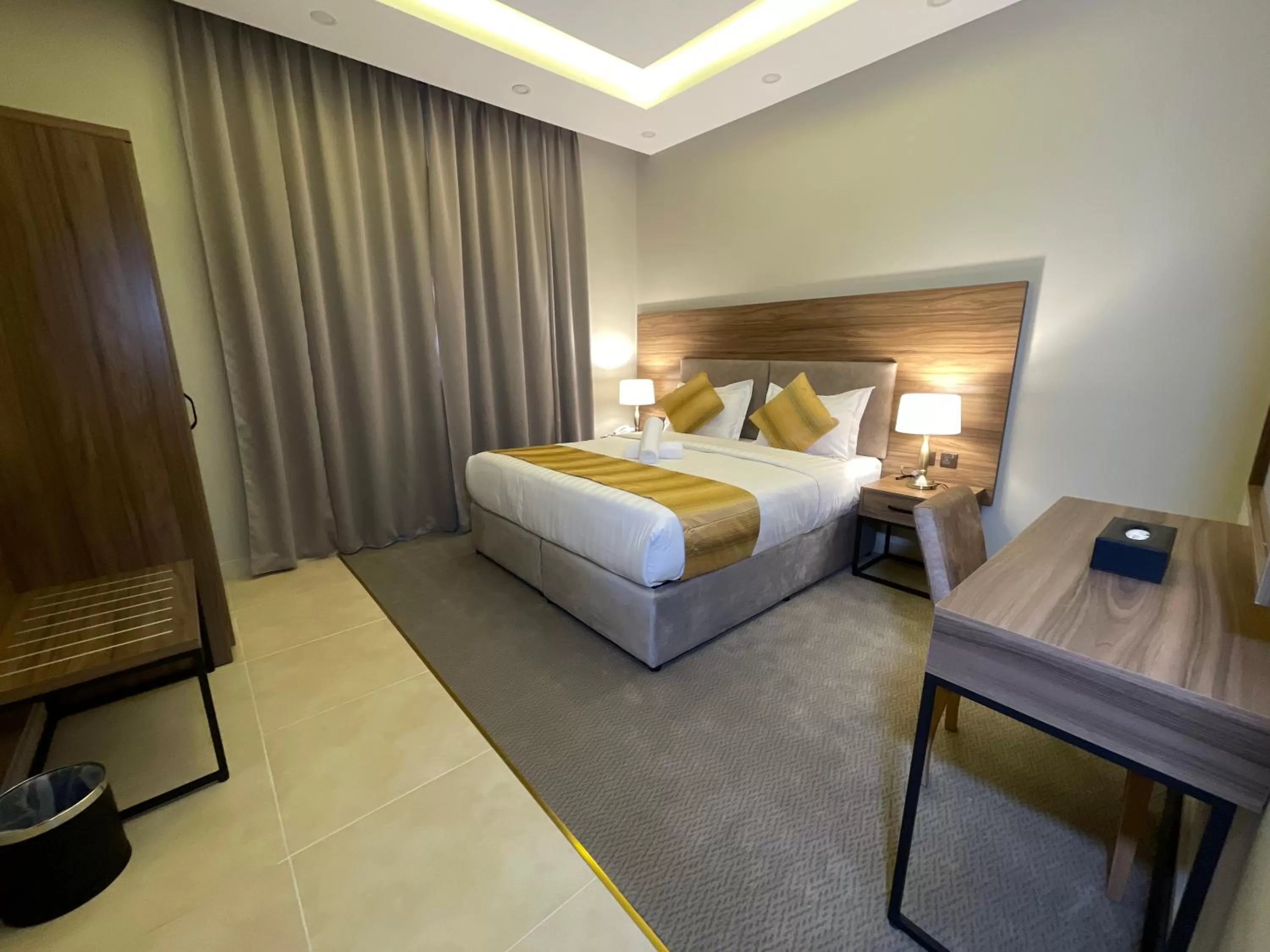 Bed in Vital House Apartments