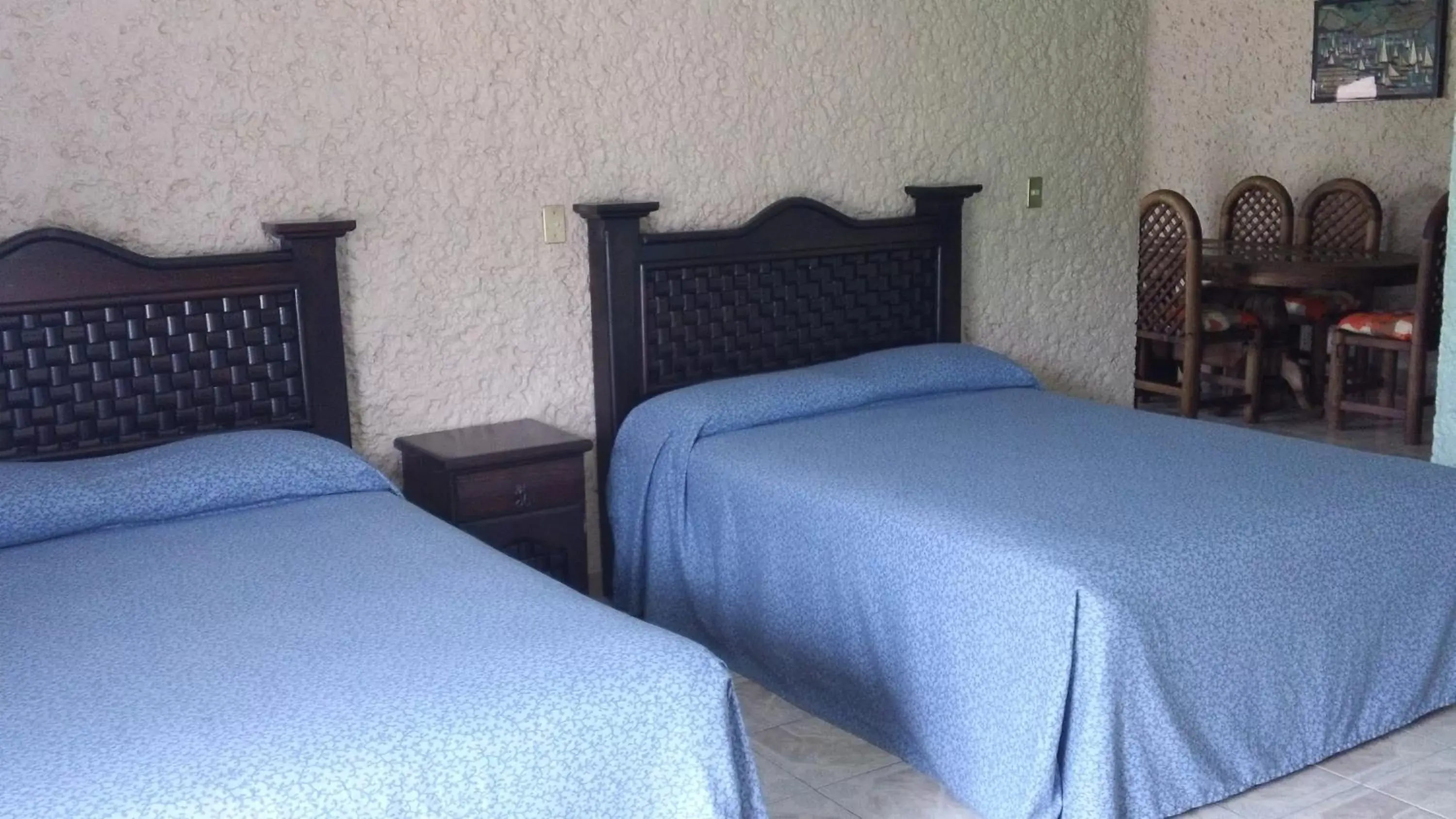 Bed in Hotel Villa Monarca Inn