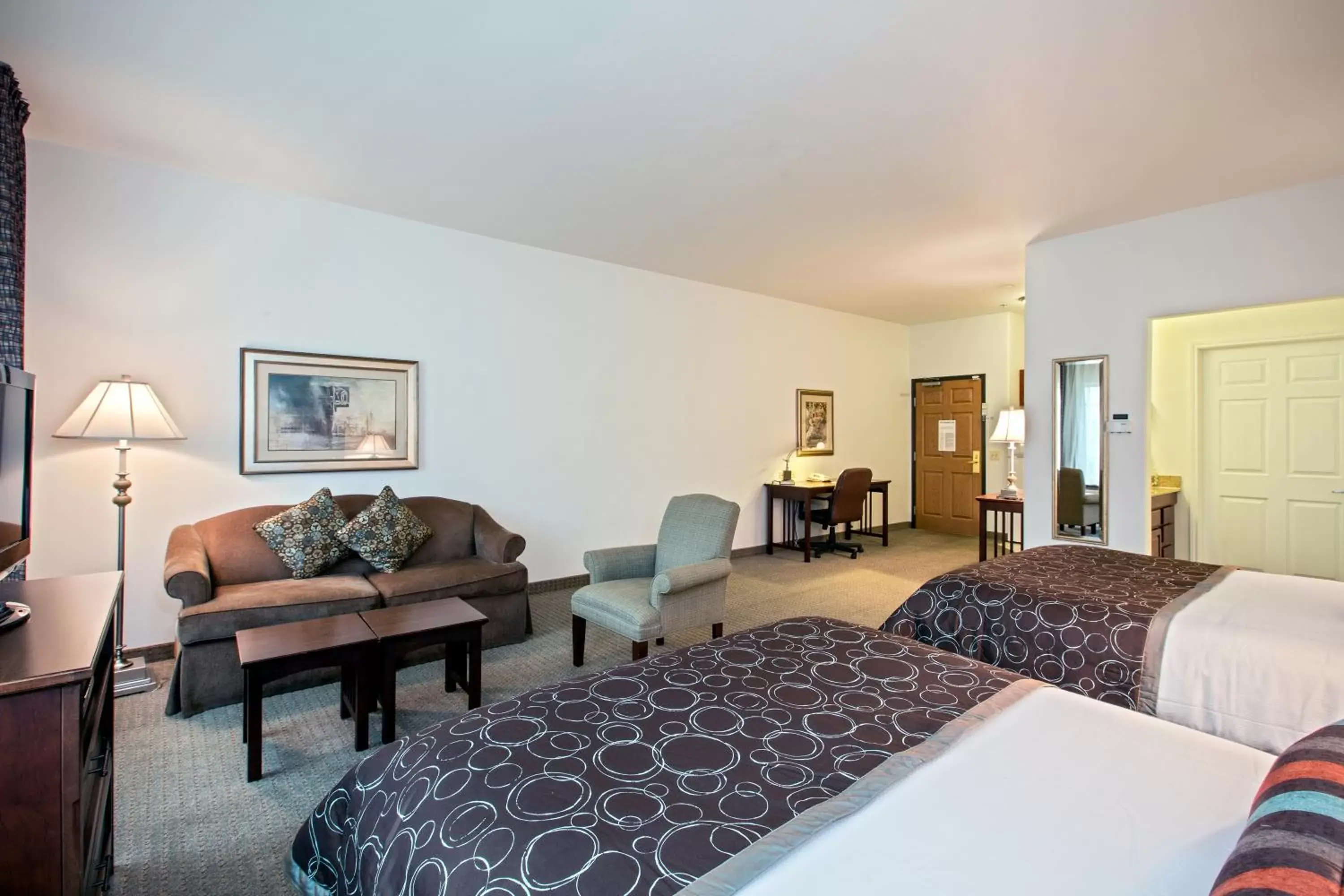 Photo of the whole room, Seating Area in Staybridge Suites Rockford, an IHG Hotel