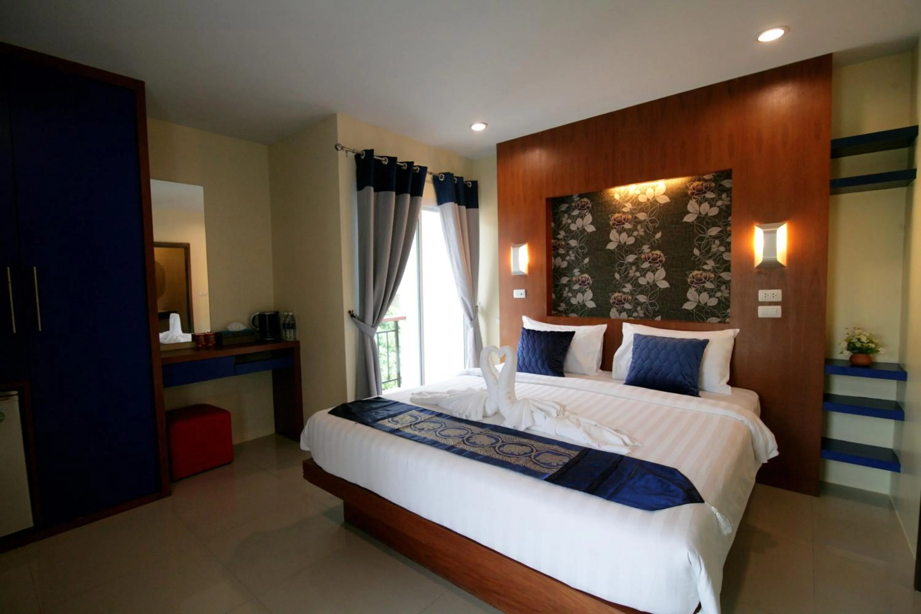Bed in Calypso Patong Hotel