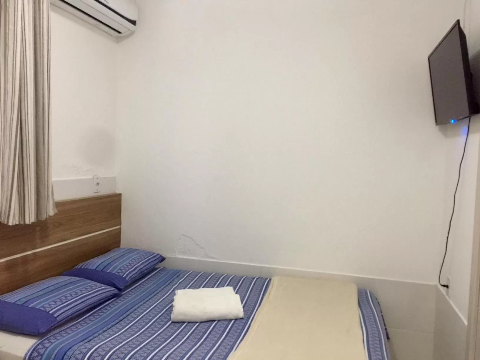 Bed in Pousada Almeida