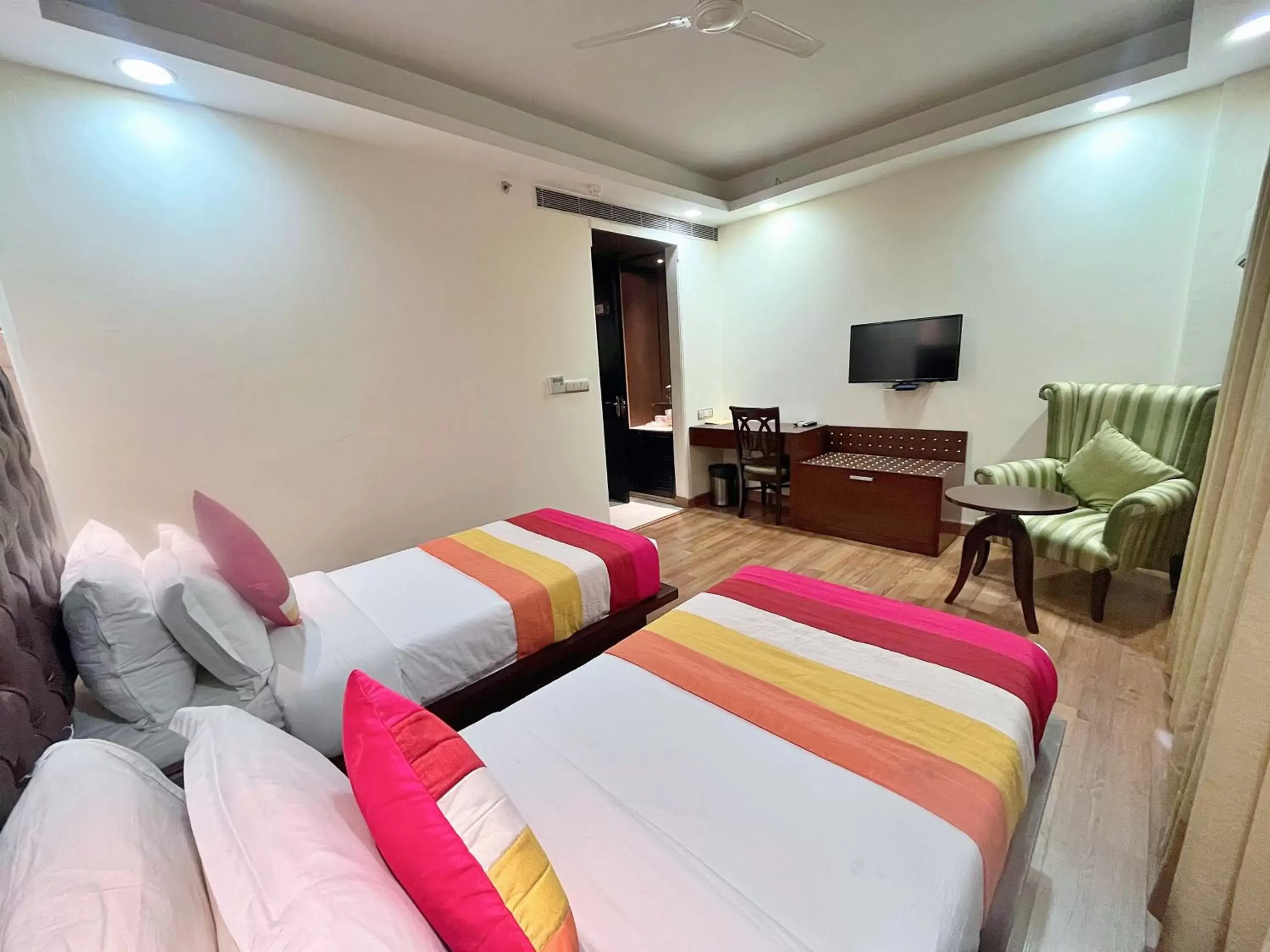 Photo of the whole room, Bed in The Grand Orion - Kailash Colony