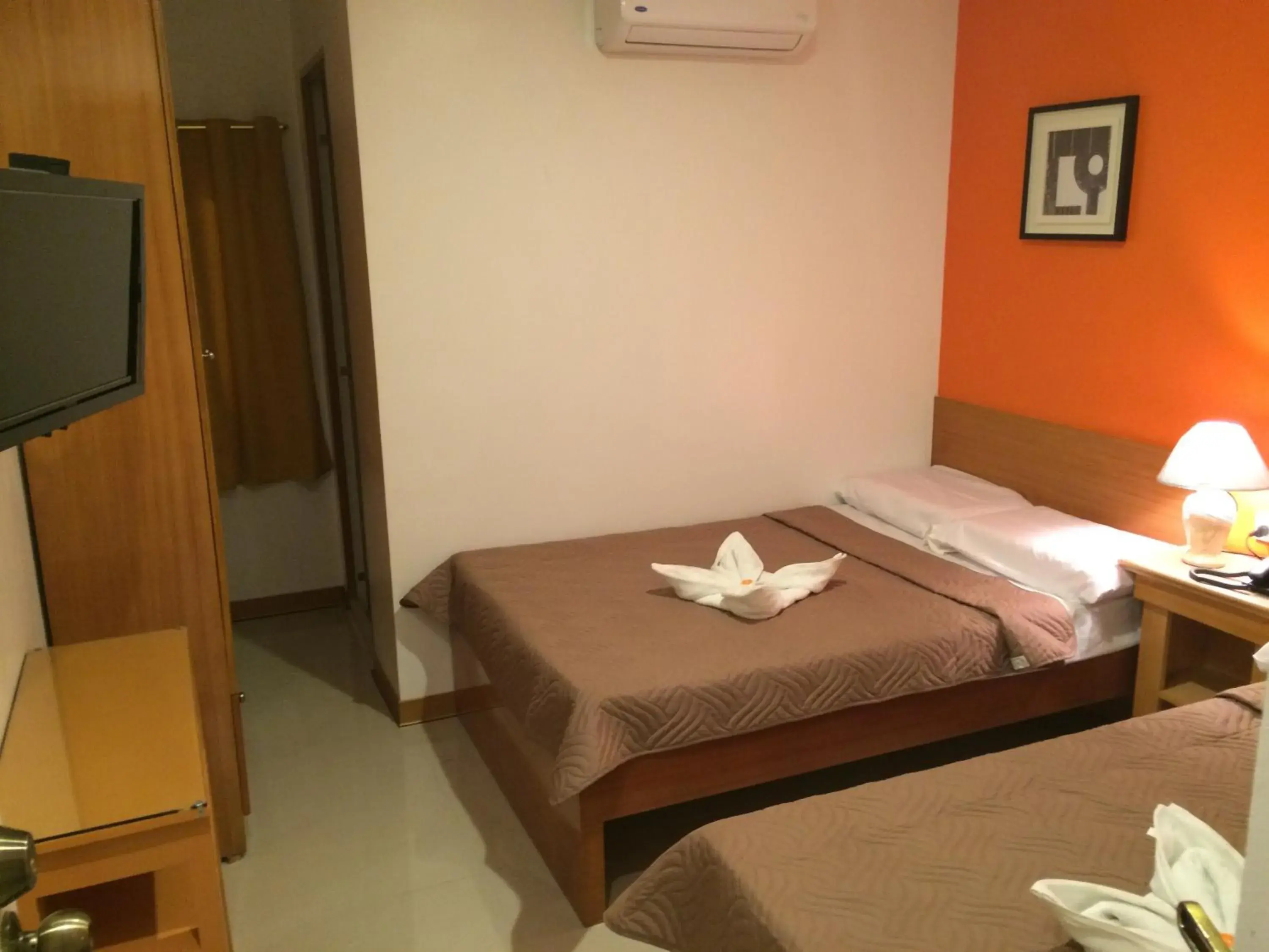 Quadruple Room with Private Bathroom in Stone House Hotel Pasay