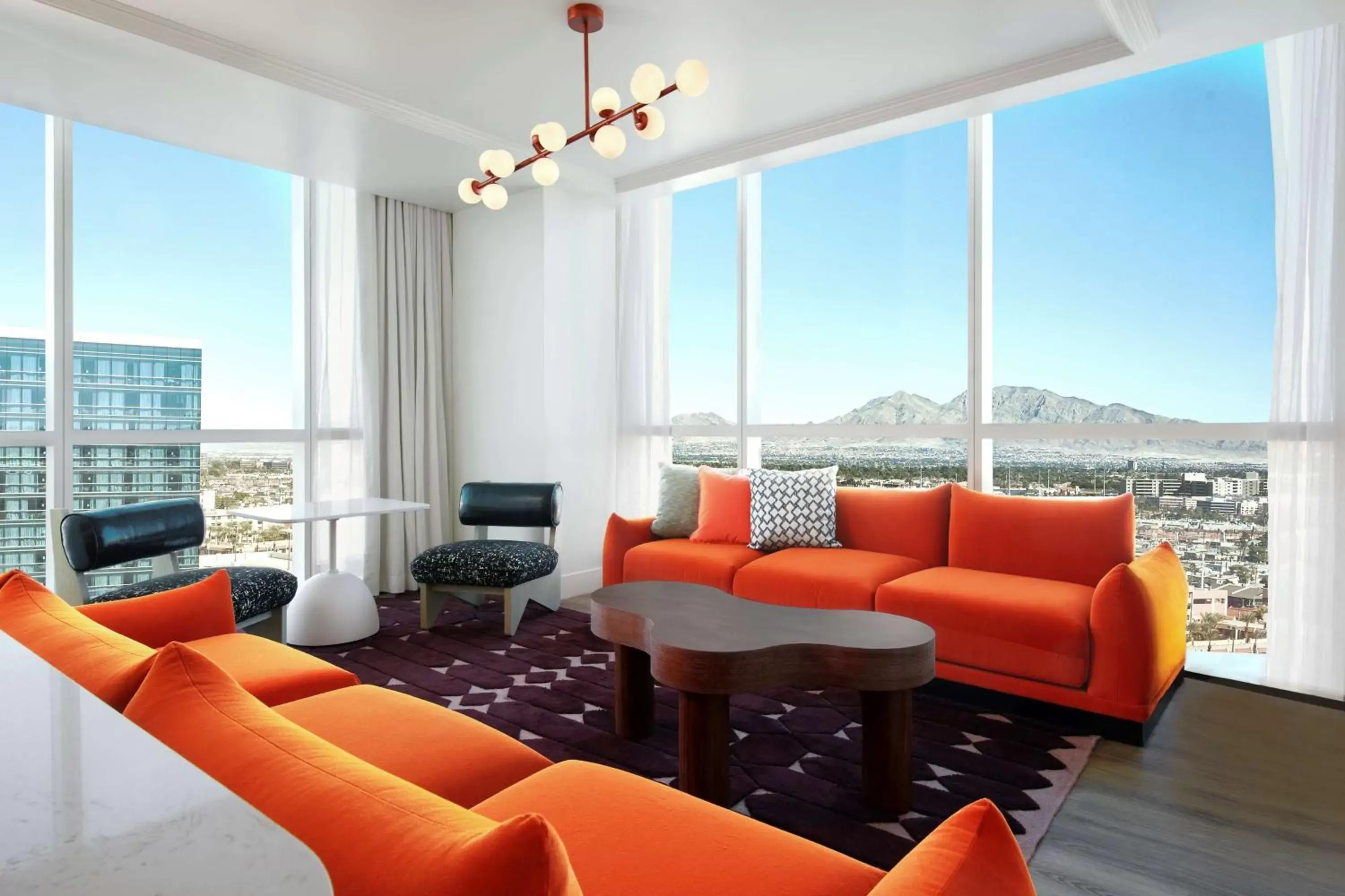 Living room in Virgin Hotels Las Vegas, Curio Collection by Hilton