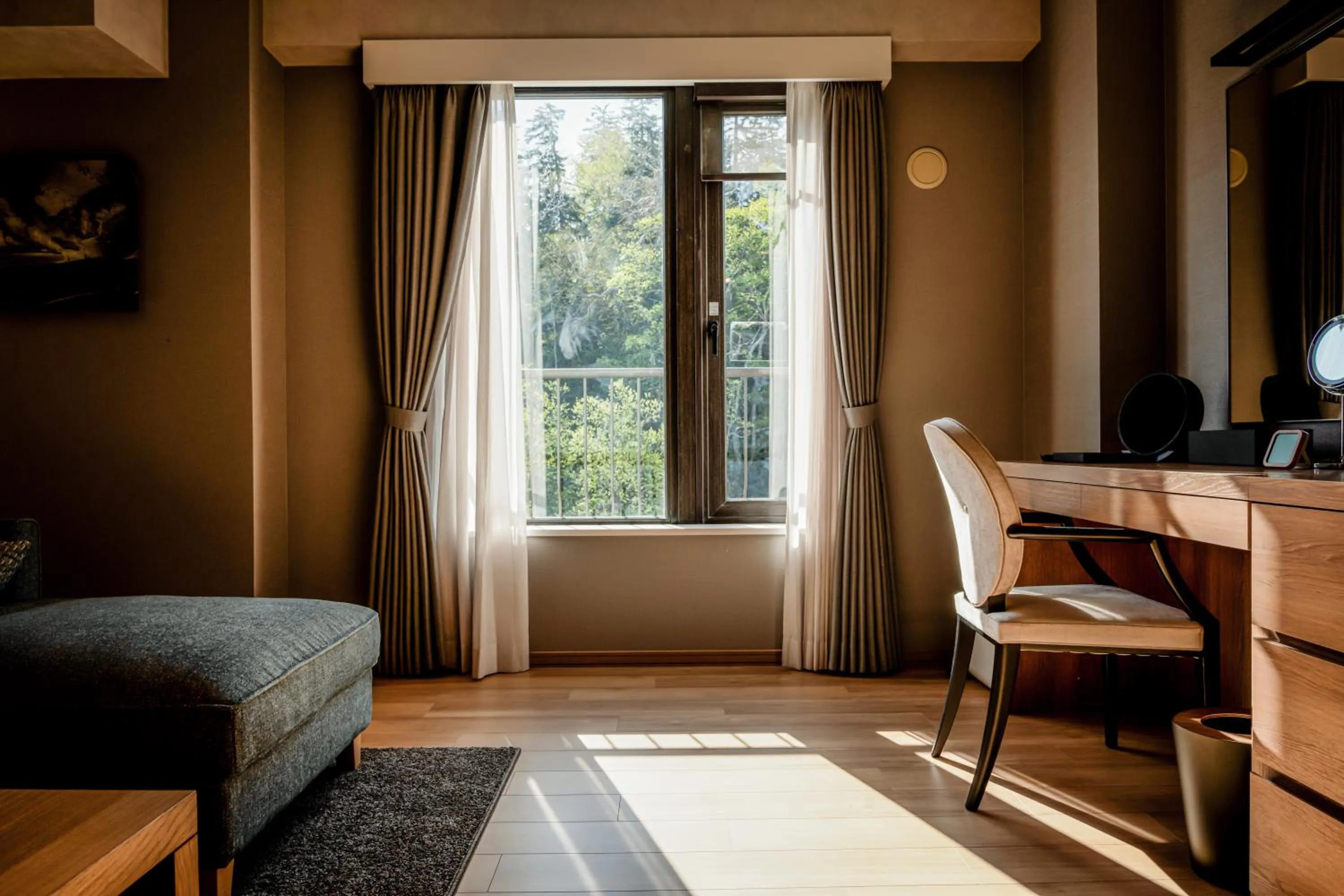 Living room, Bed in Higashikawa Asahidake Onsen Hotel Bear Monte