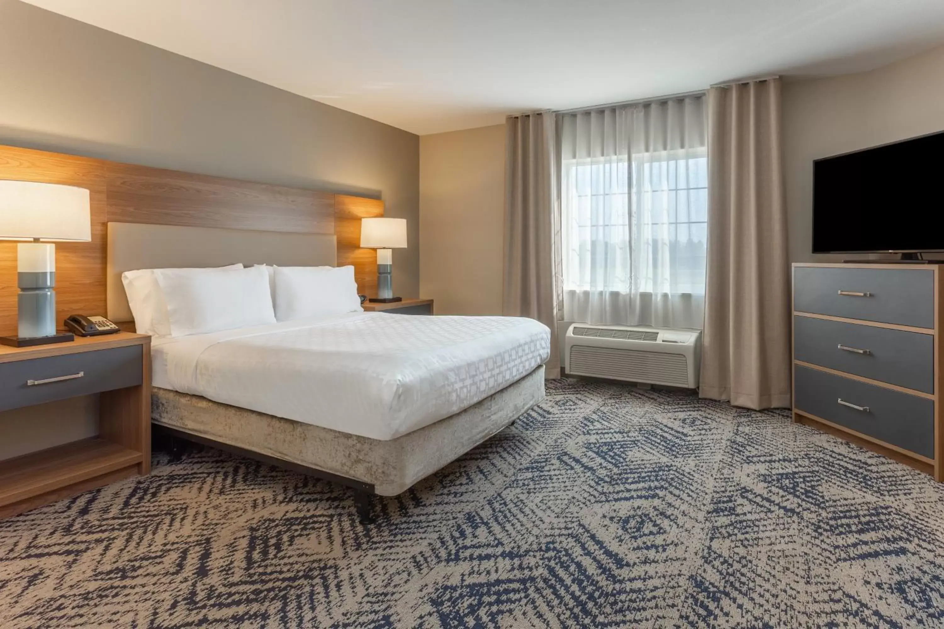 Photo of the whole room, Bed in Candlewood Suites Ofallon, Il - St. Louis Area, an IHG Hotel
