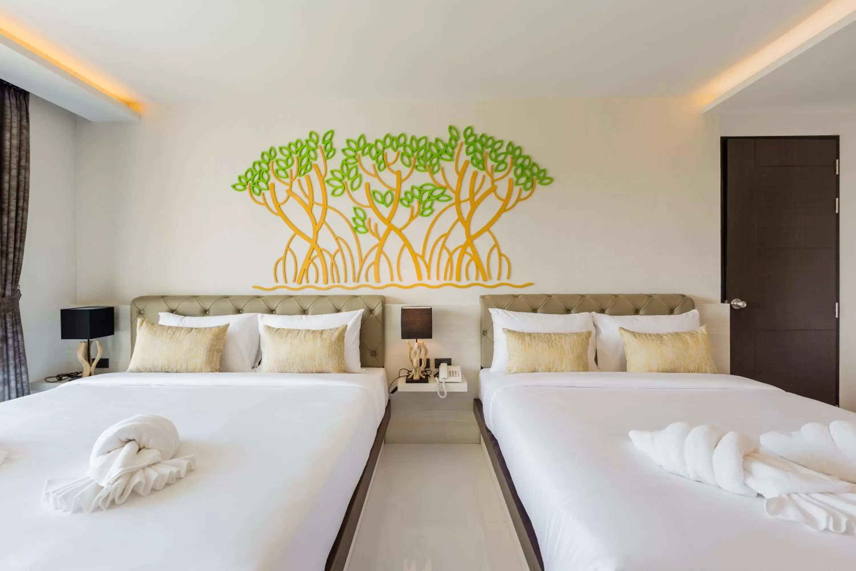 Bed in River Front Krabi Hotel