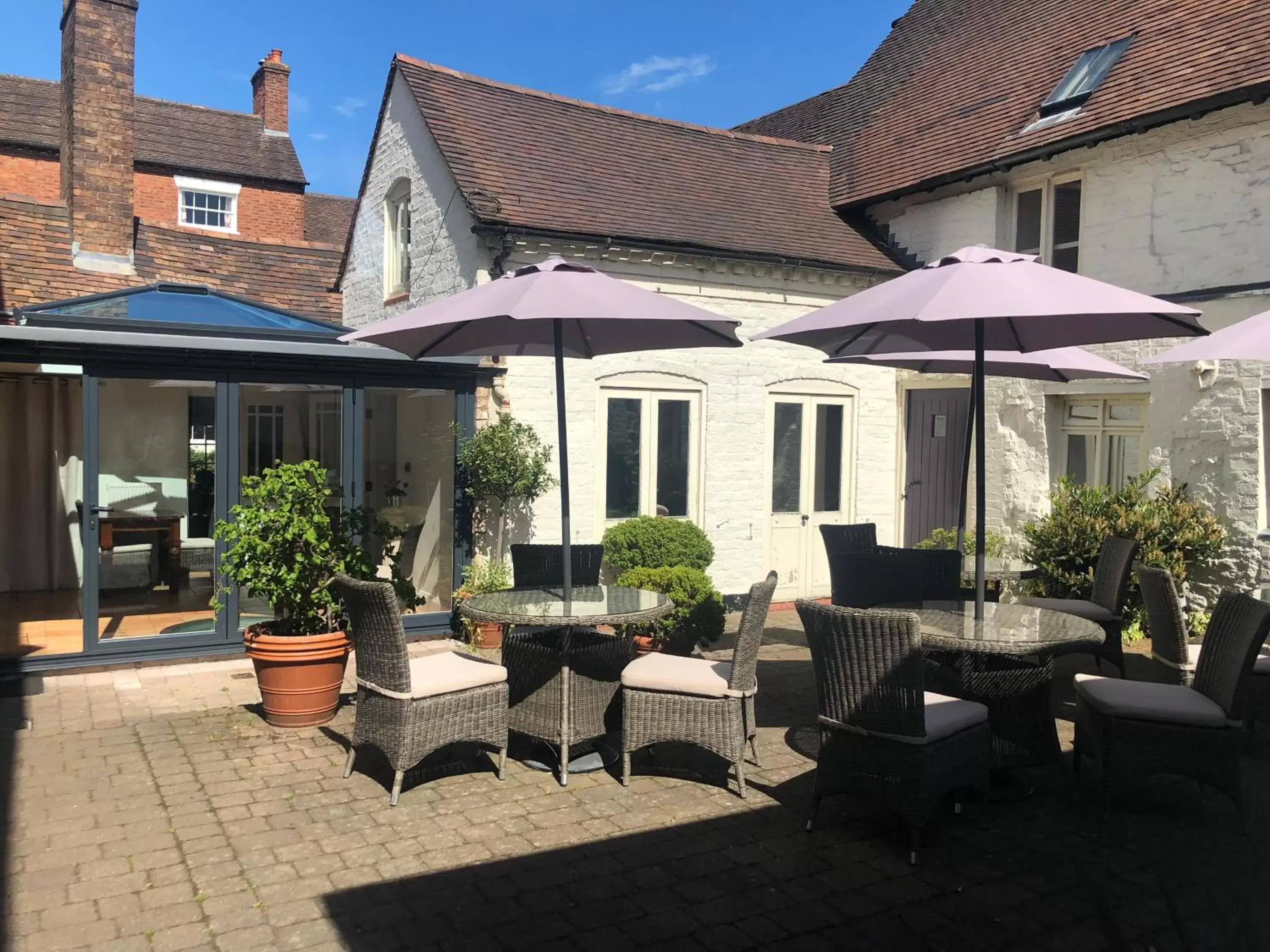 Patio, Property Building in The Raven Hotel