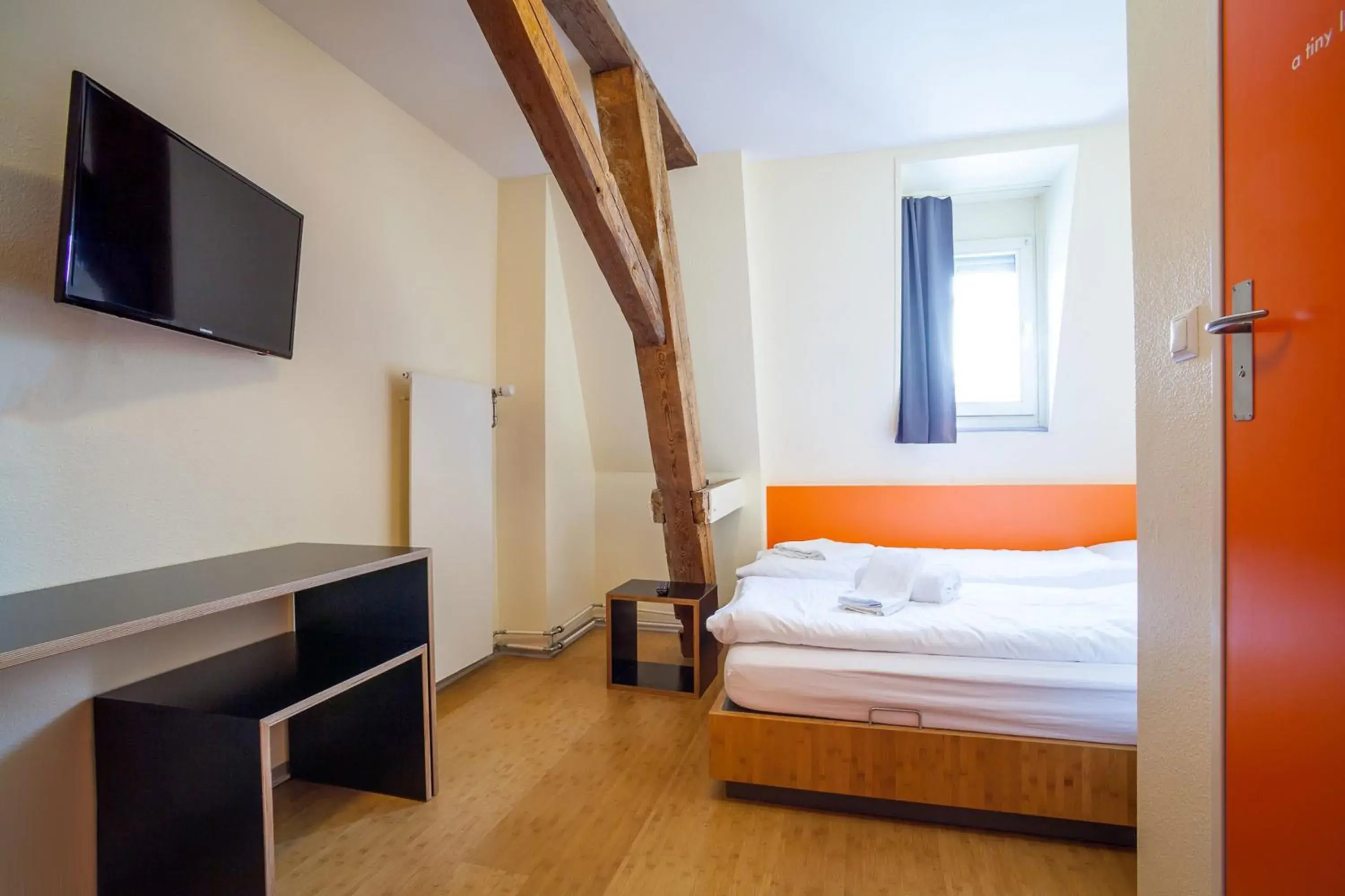 Photo of the whole room, Bed in easyHotel Basel City