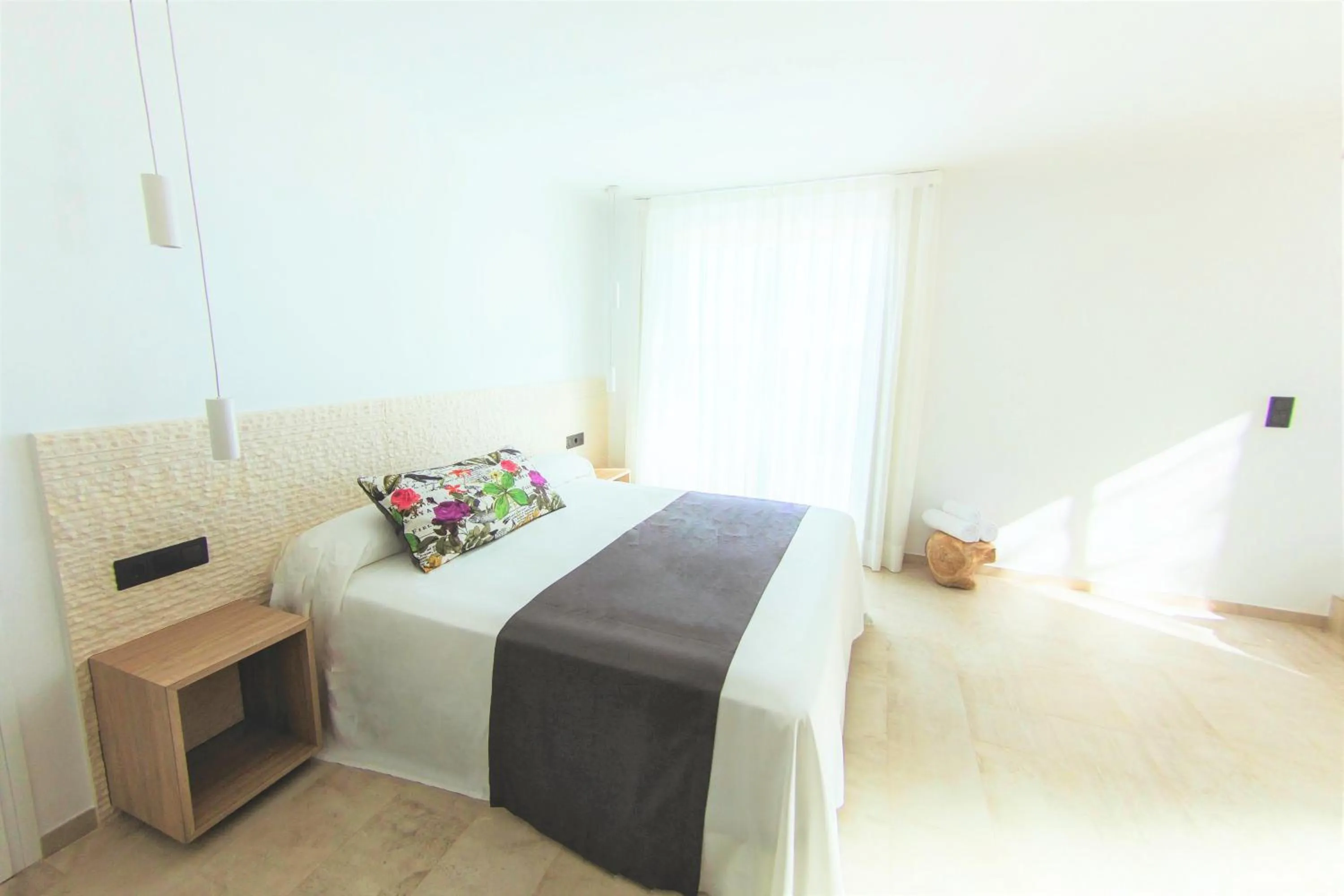 Bed in Botaniq Hotel Boutique