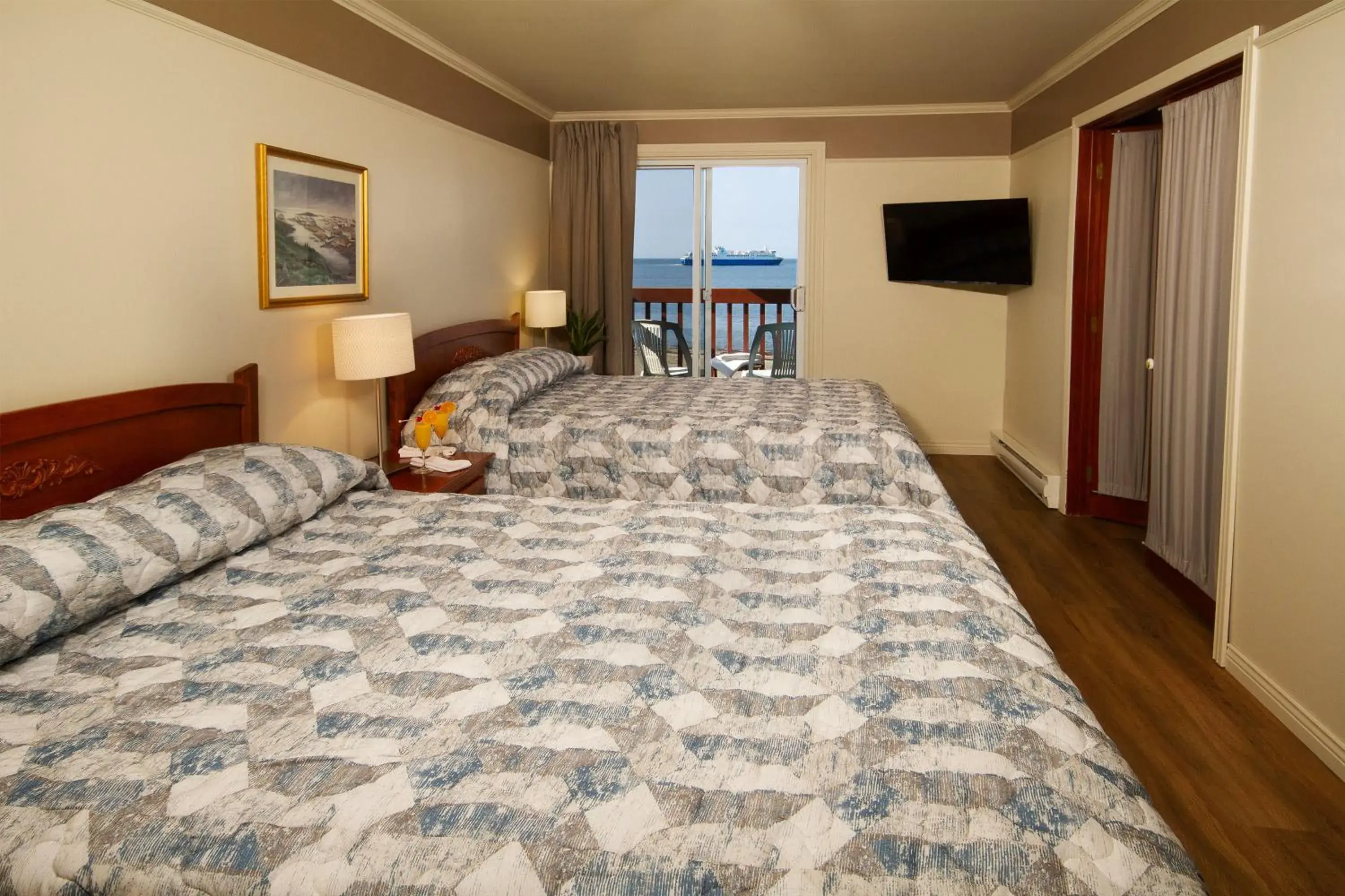 Bed in Hotel Motel Belle Plage