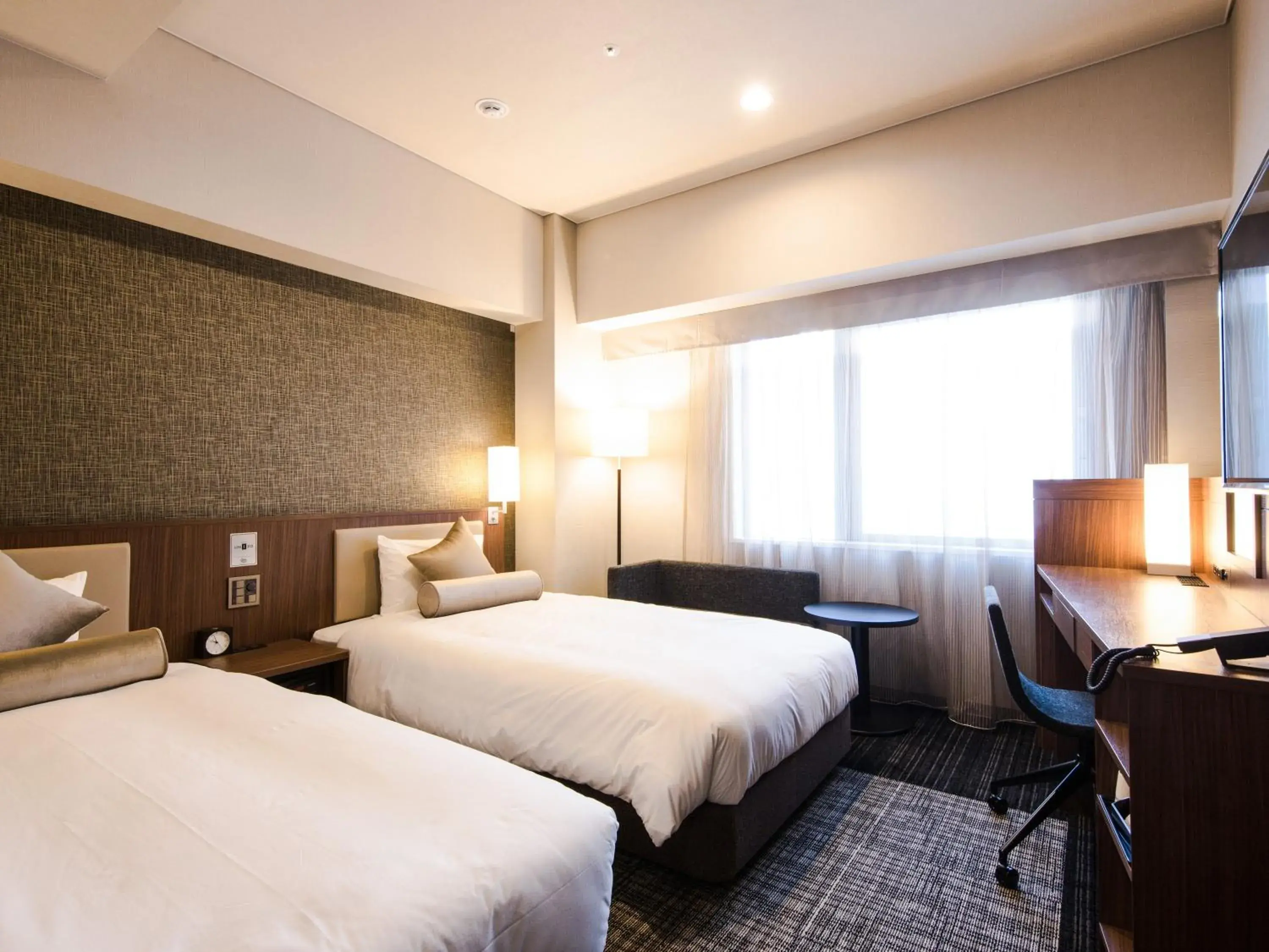 Photo of the whole room, Bed in HOTEL UNIZO Yokohamaeki-West