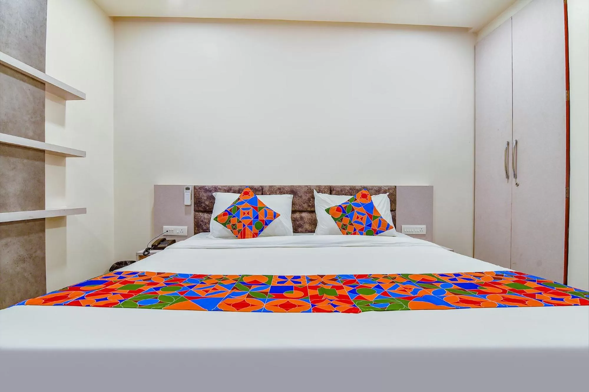 Bed in FabHotel Prime Rudra