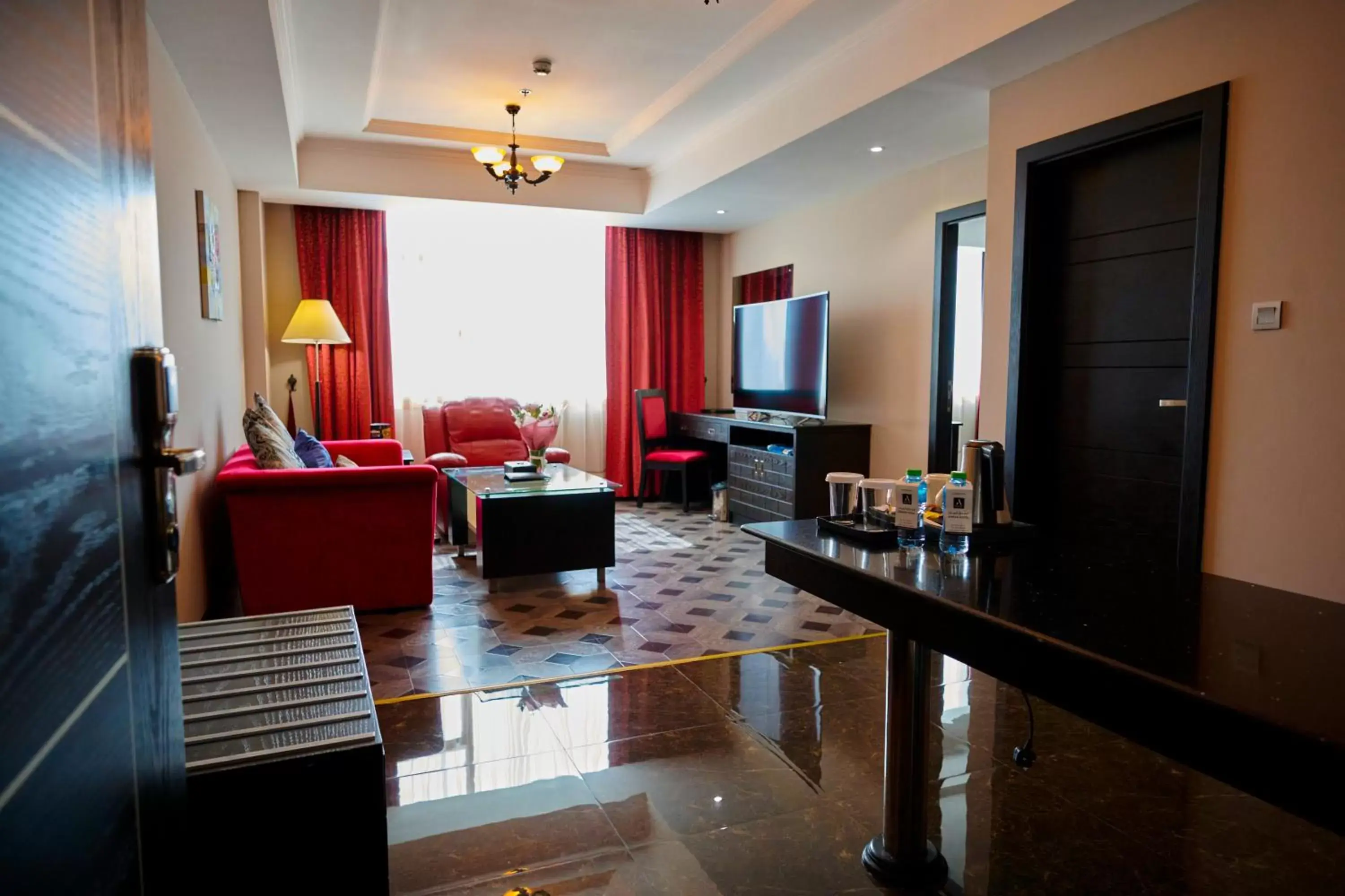 Communal lounge/ TV room, Seating Area in Arman Hotel Juffair Mall