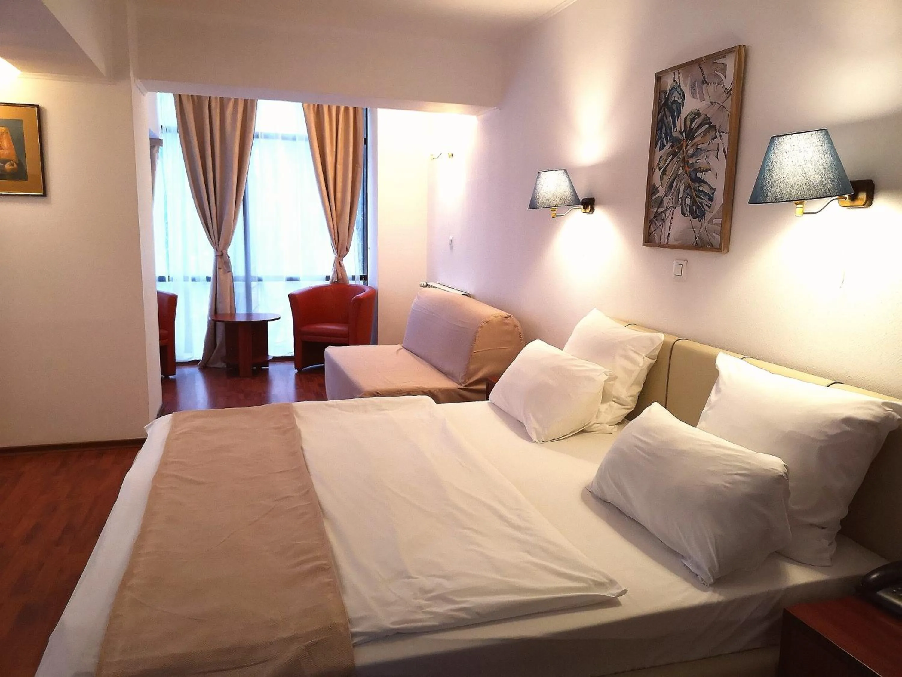 Bed in Atrium Hotel Bucharest City Center