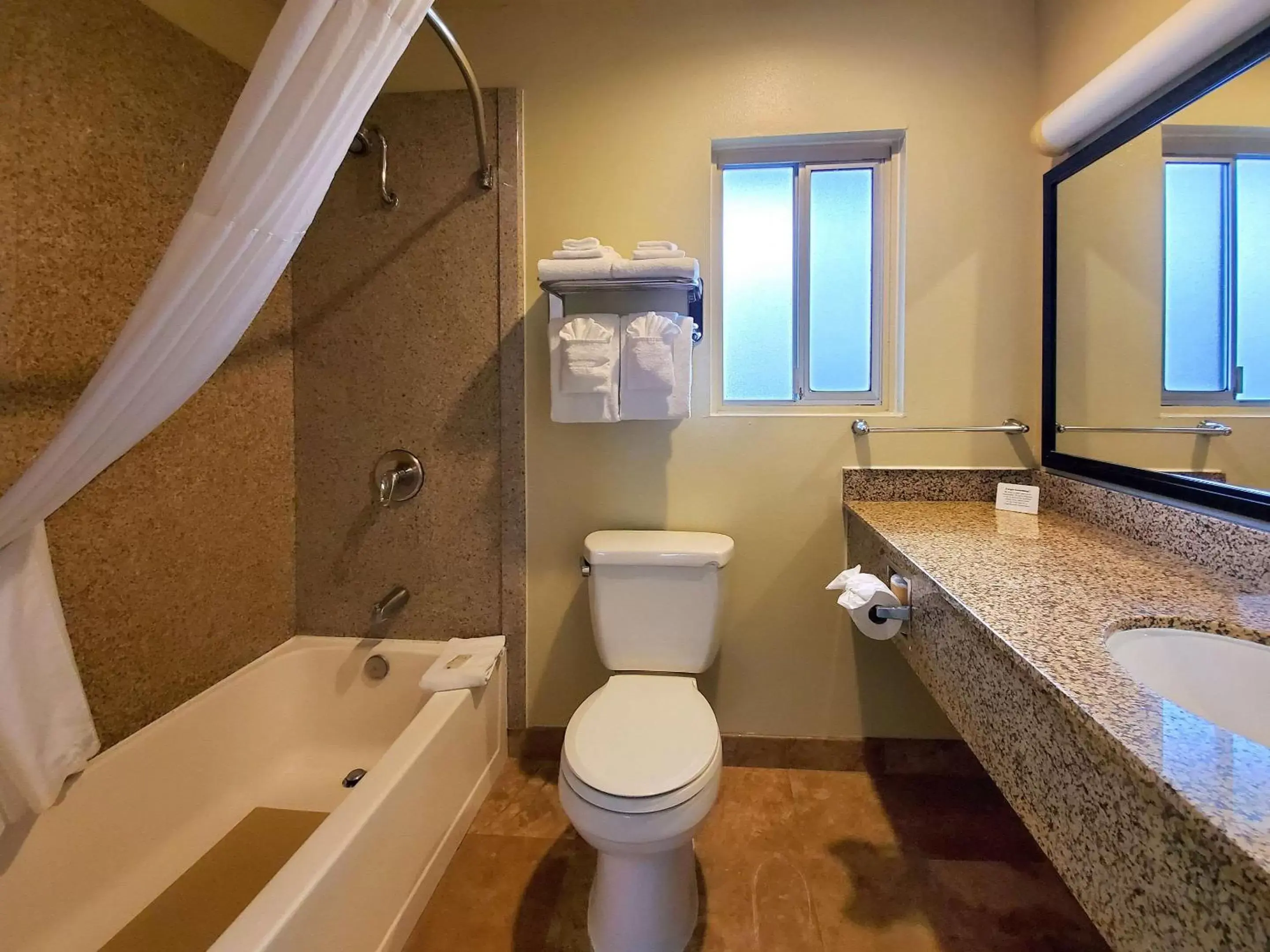 Bedroom in Quality Inn & Suites Anaheim at the Park Bedroom in Quality Inn & Suites Anaheim at the Park