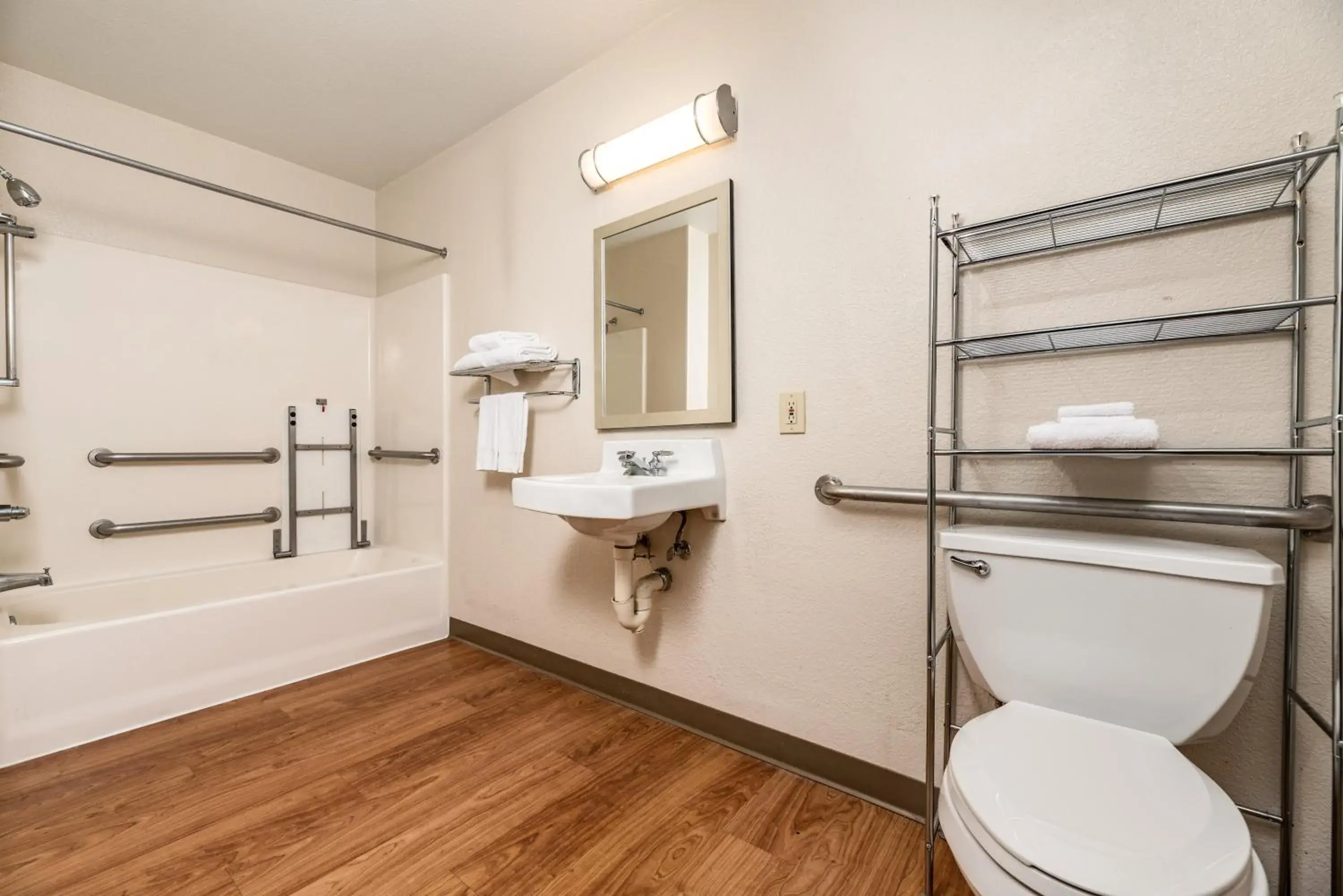 Property building, Bathroom in HomeTowne Studios by Red Roof Fresno - West