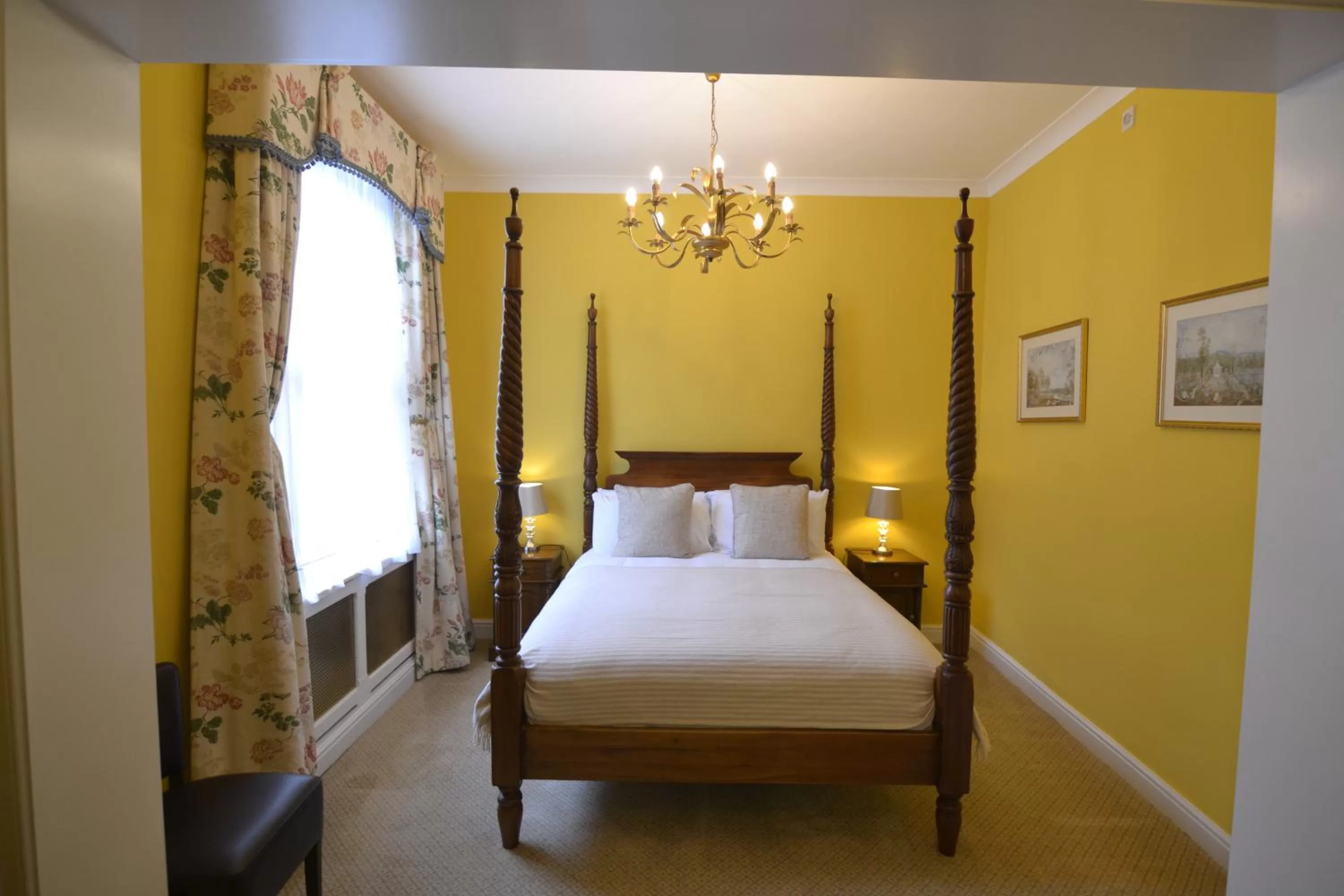 Bed in Angel and Royal Hotel