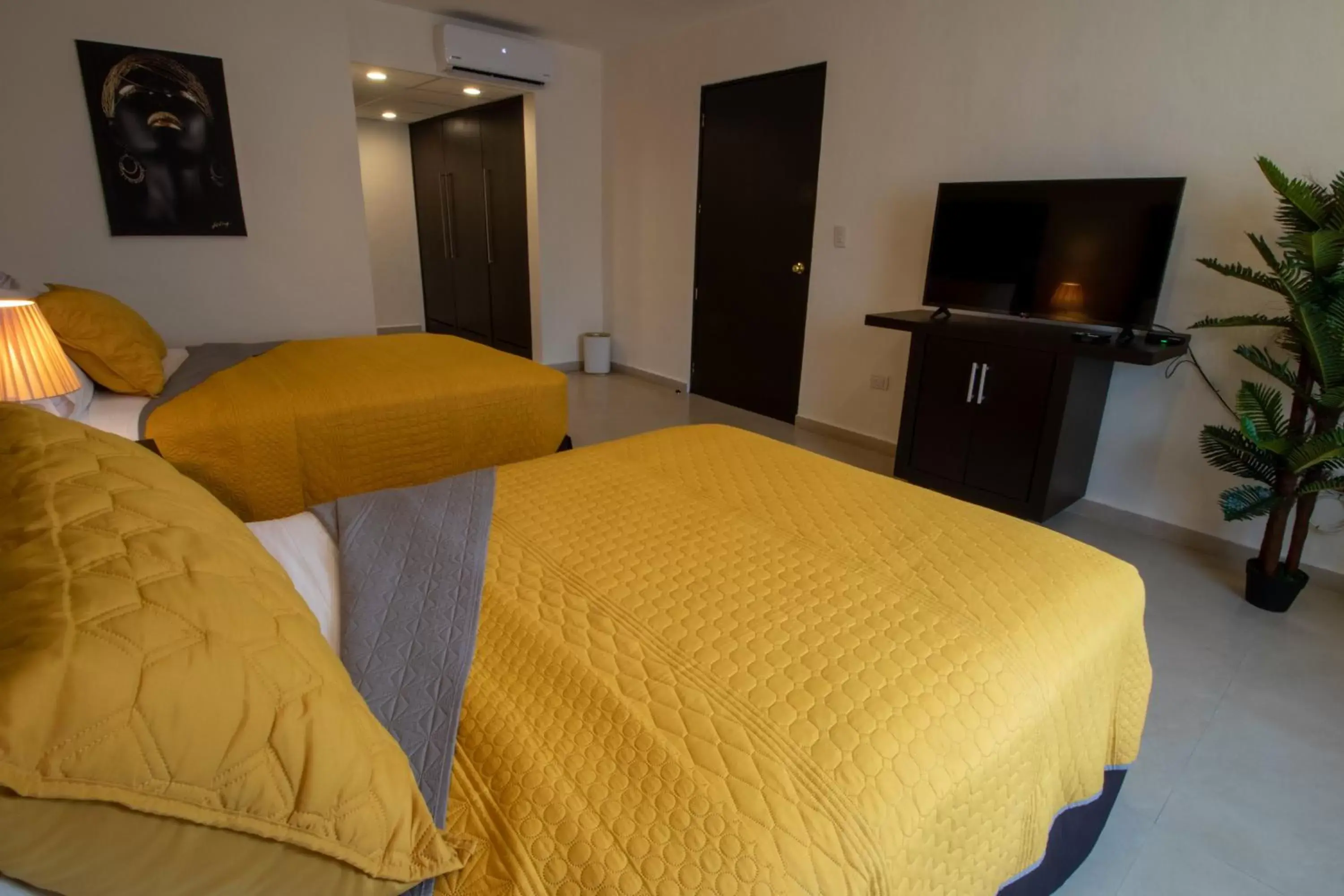 Bed in Hotel Villas Segovia Suites Playa del Carmen