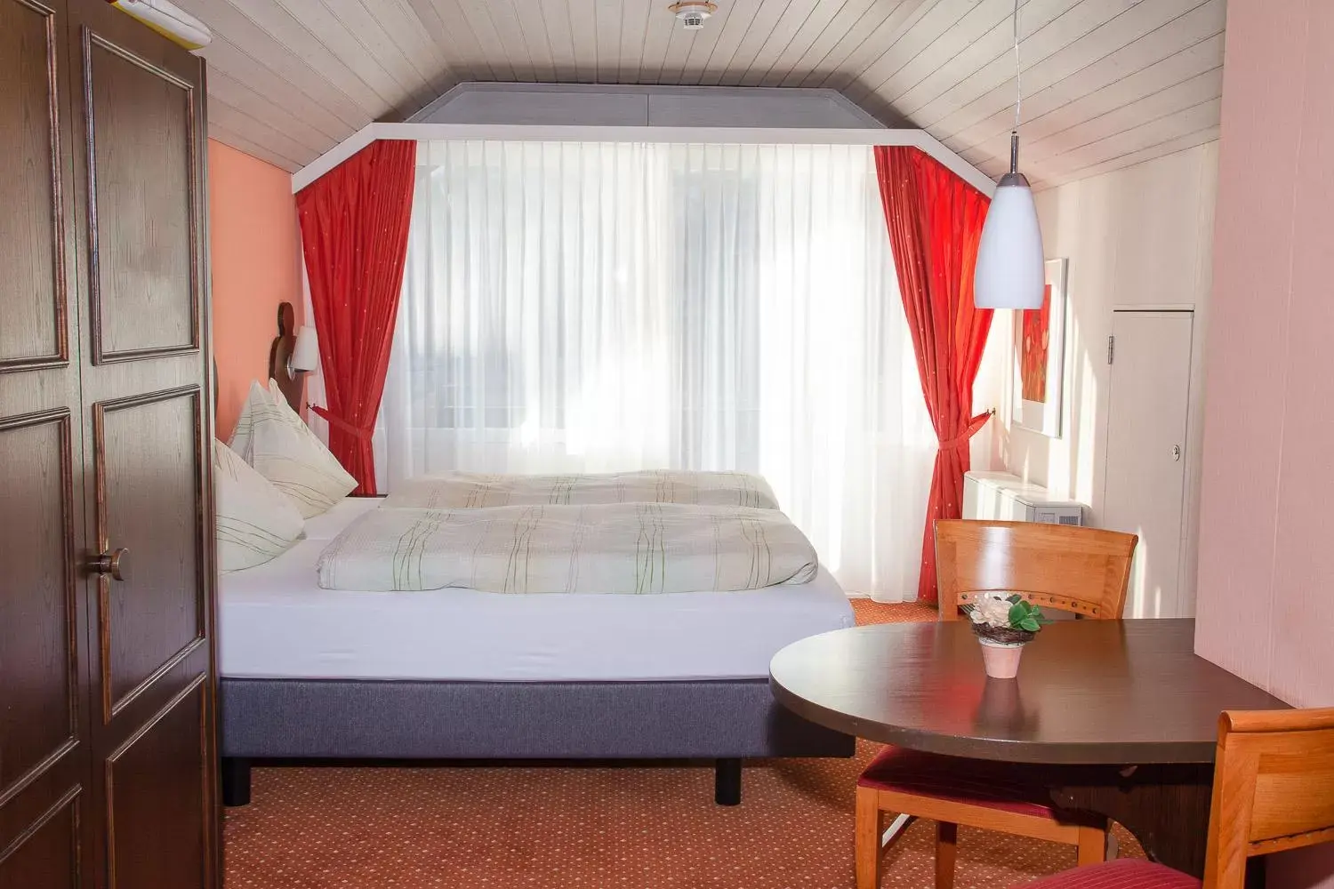 Photo of the whole room, Bed in Hotel-Restaurant Seegarten-Marina