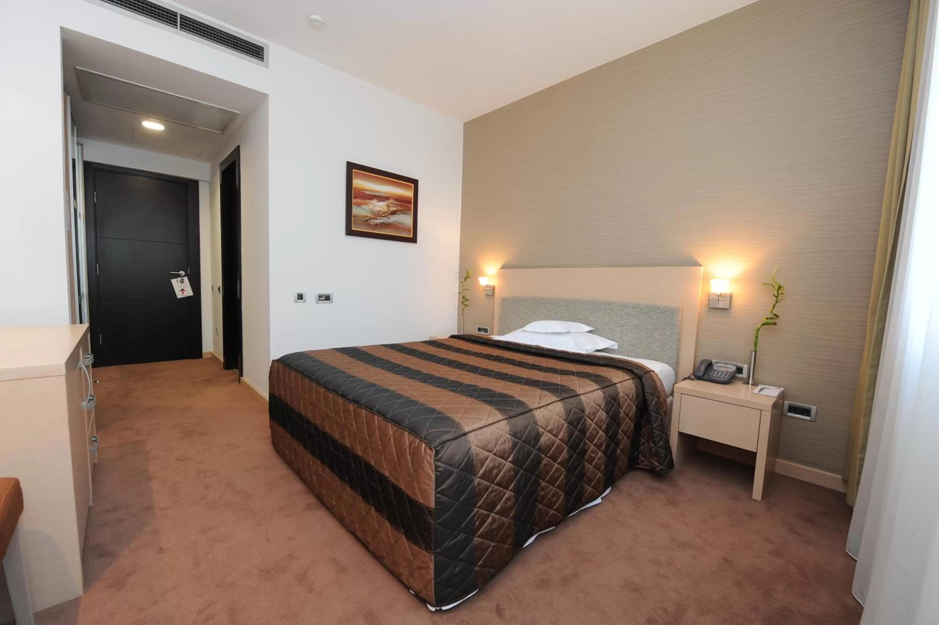 Bed in IN Hotel Beograd