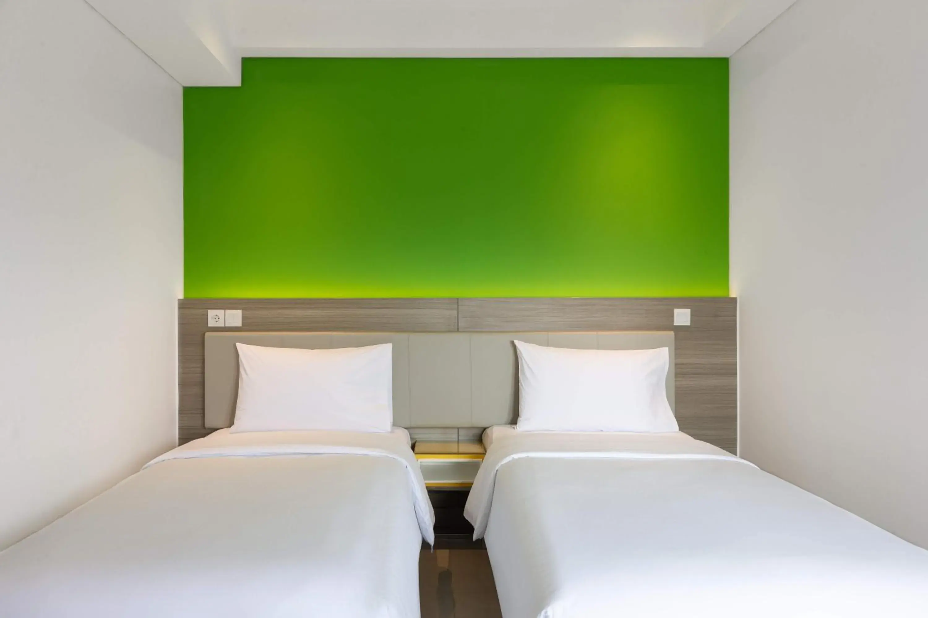 Bed in Amaris Hotel Slipi