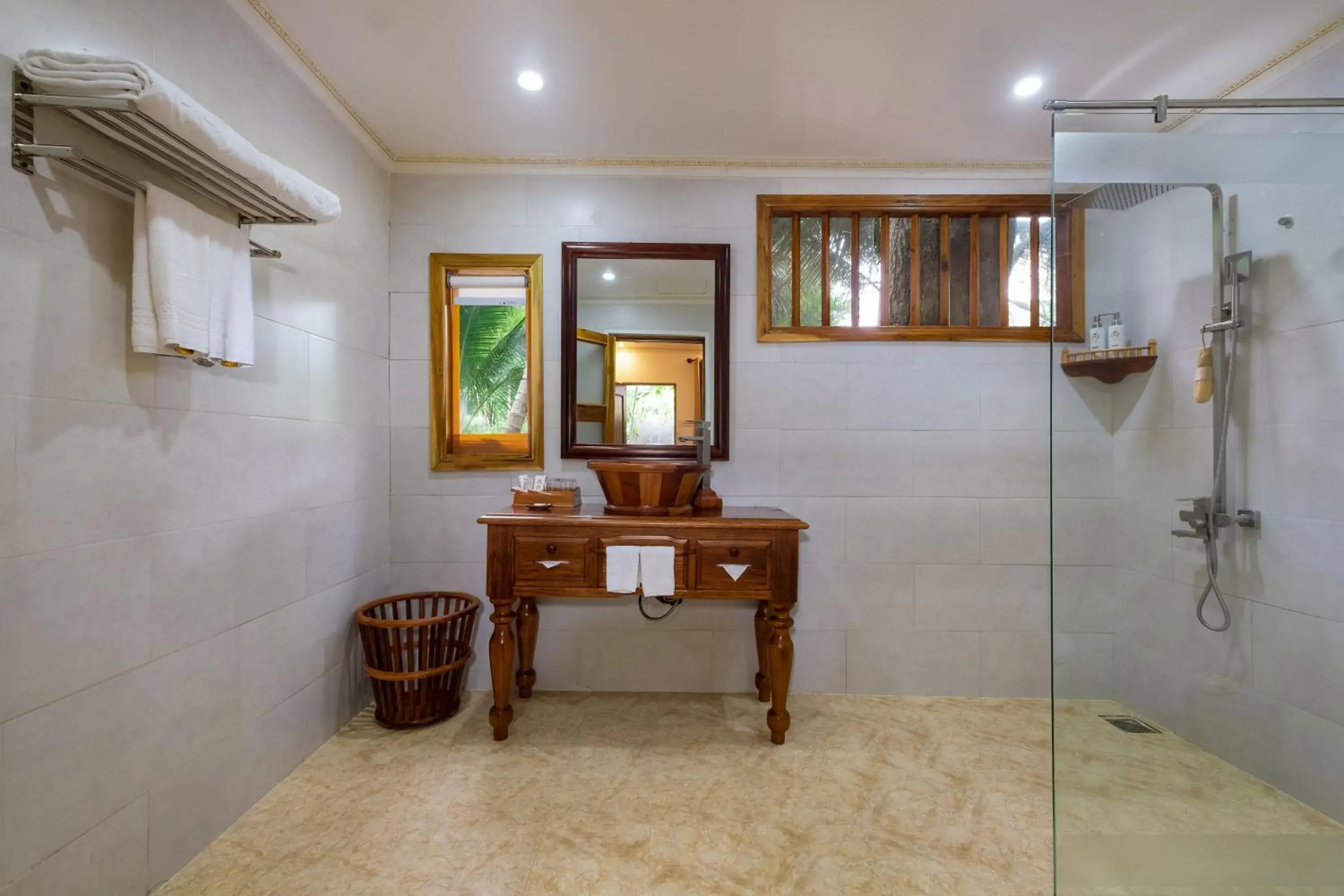 Bathroom in Coco Palm Beach Resort & Spa