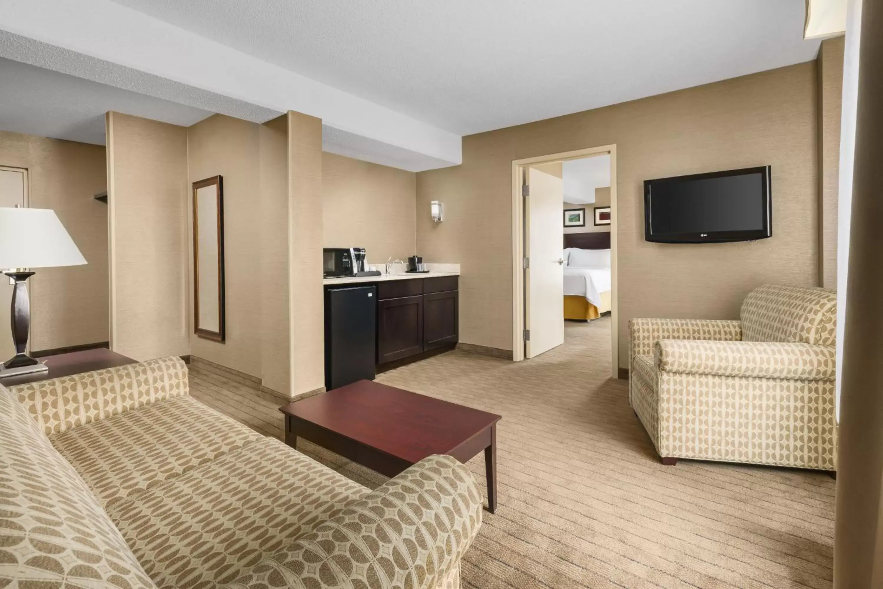 Bedroom, TV/Entertainment Center in Holiday Inn Express Boston Brockton, an IHG Hotel