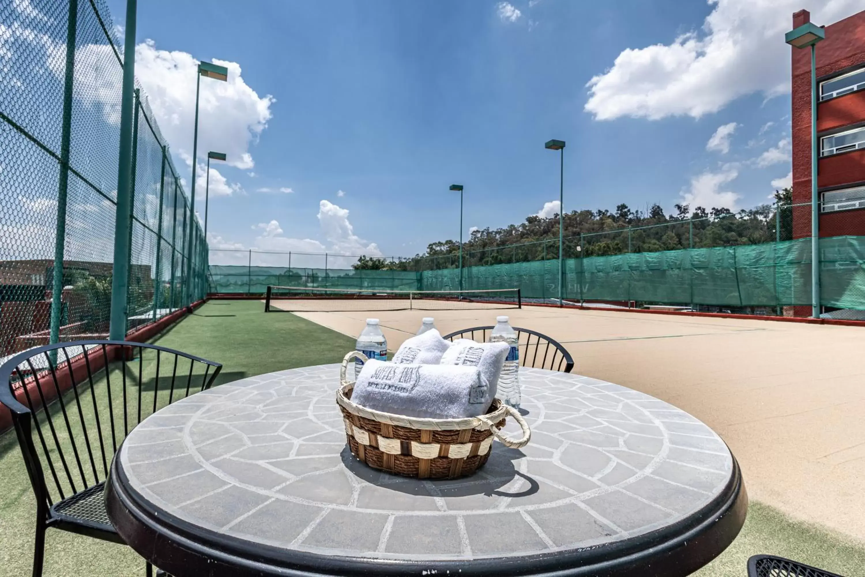 Tennis court in Suites Inn la Muralla Hotel & Spa