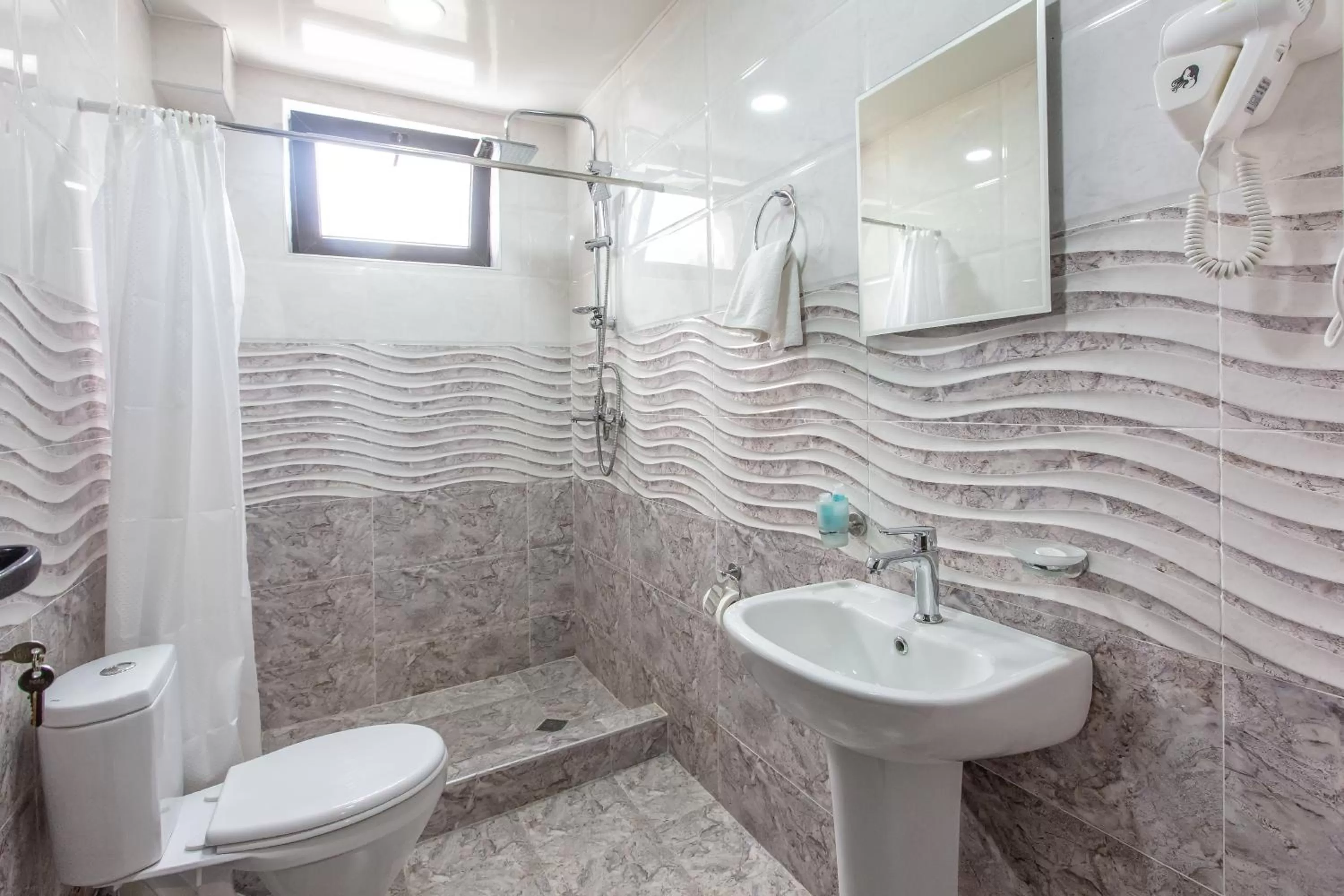 Toilet in Suntower Hotel