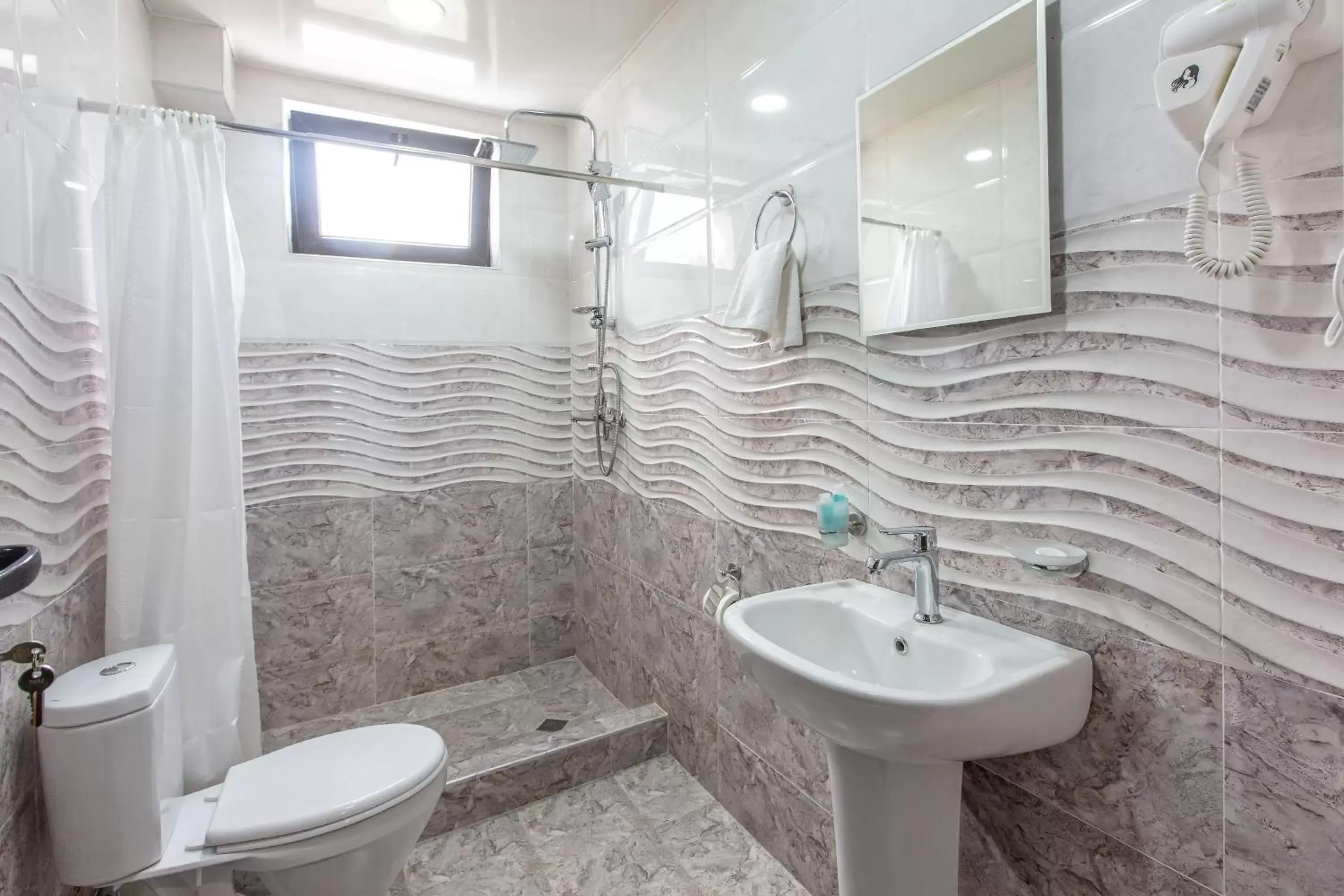 Quadruple Room - single occupancy in Suntower Hotel Quadruple Room - single occupancy in Suntower Hotel