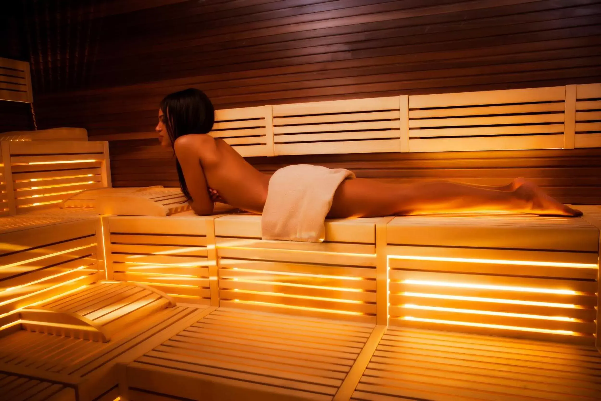 Sauna, Guests in Le Rose Suite Hotel