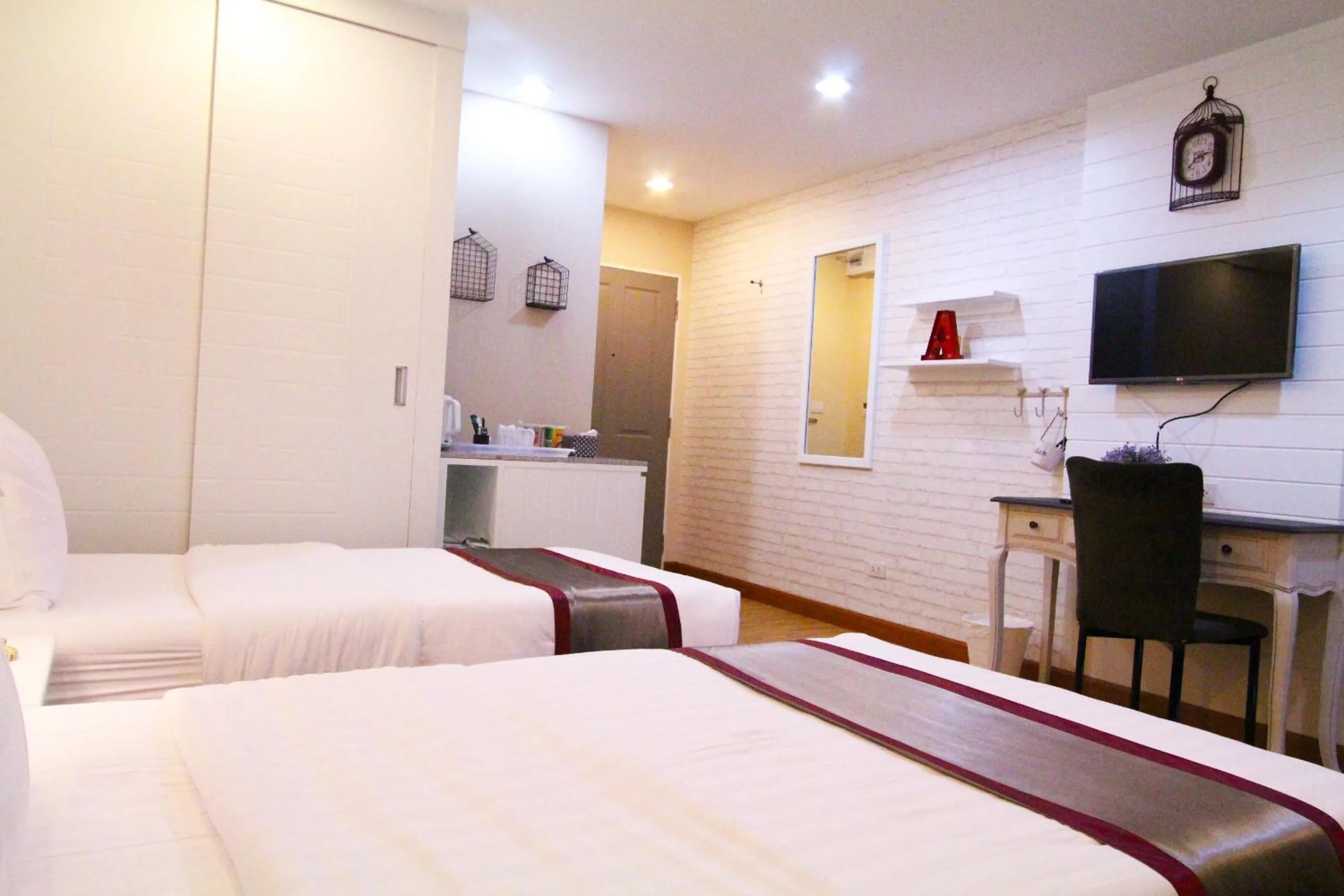 Bed in At Residence Suvarnabhumi Hotel