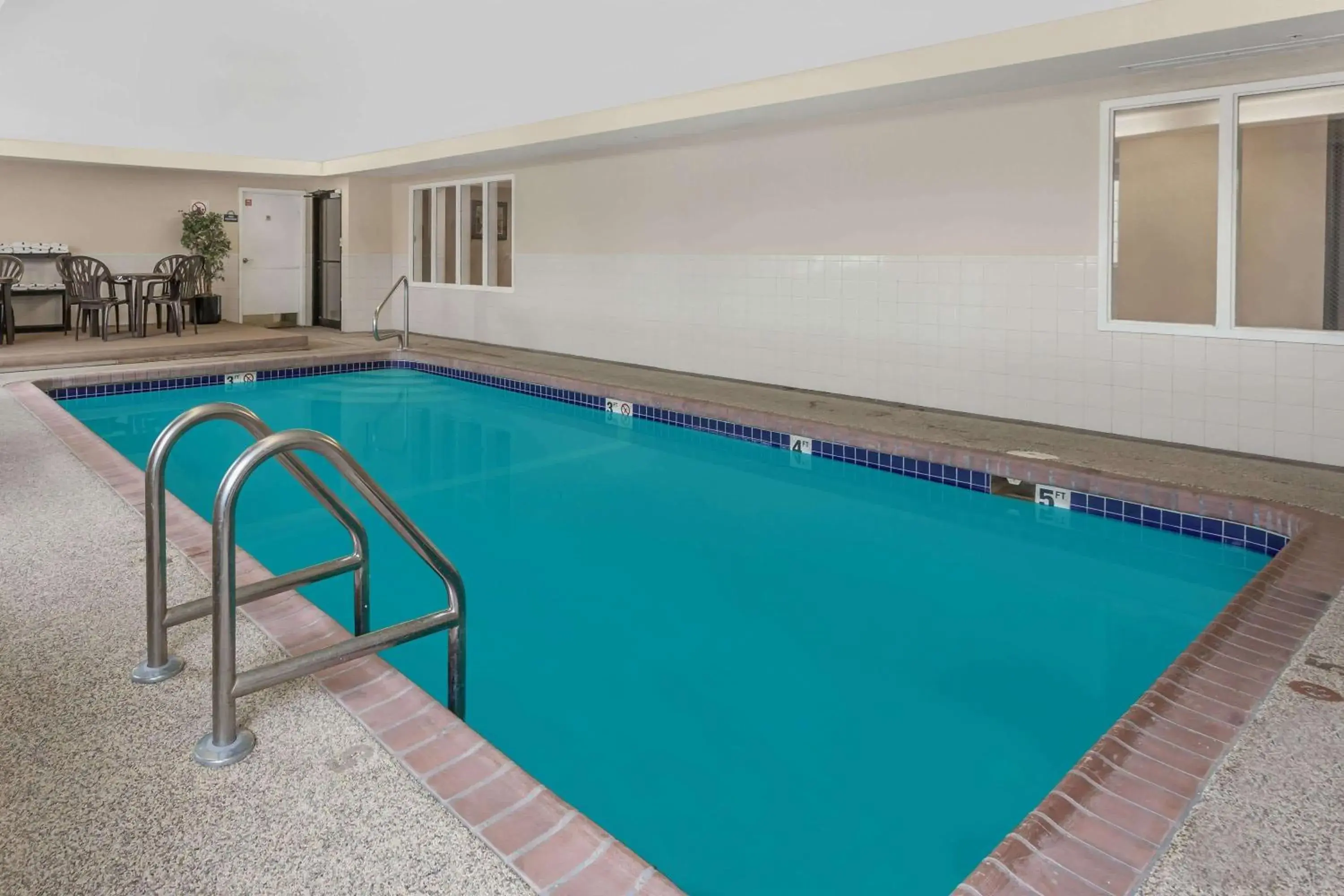 On site, Swimming Pool in Days Inn by Wyndham near Kansas Speedway