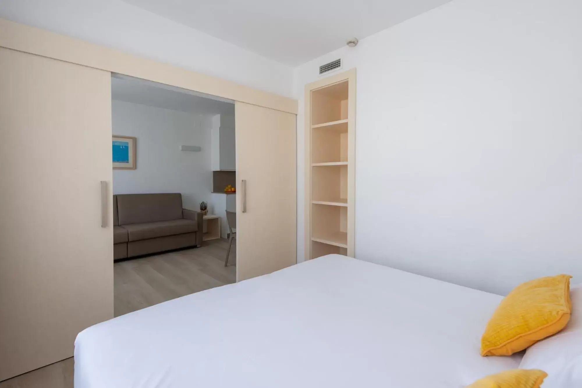 Bed in Atenea Park Suites & Apartments