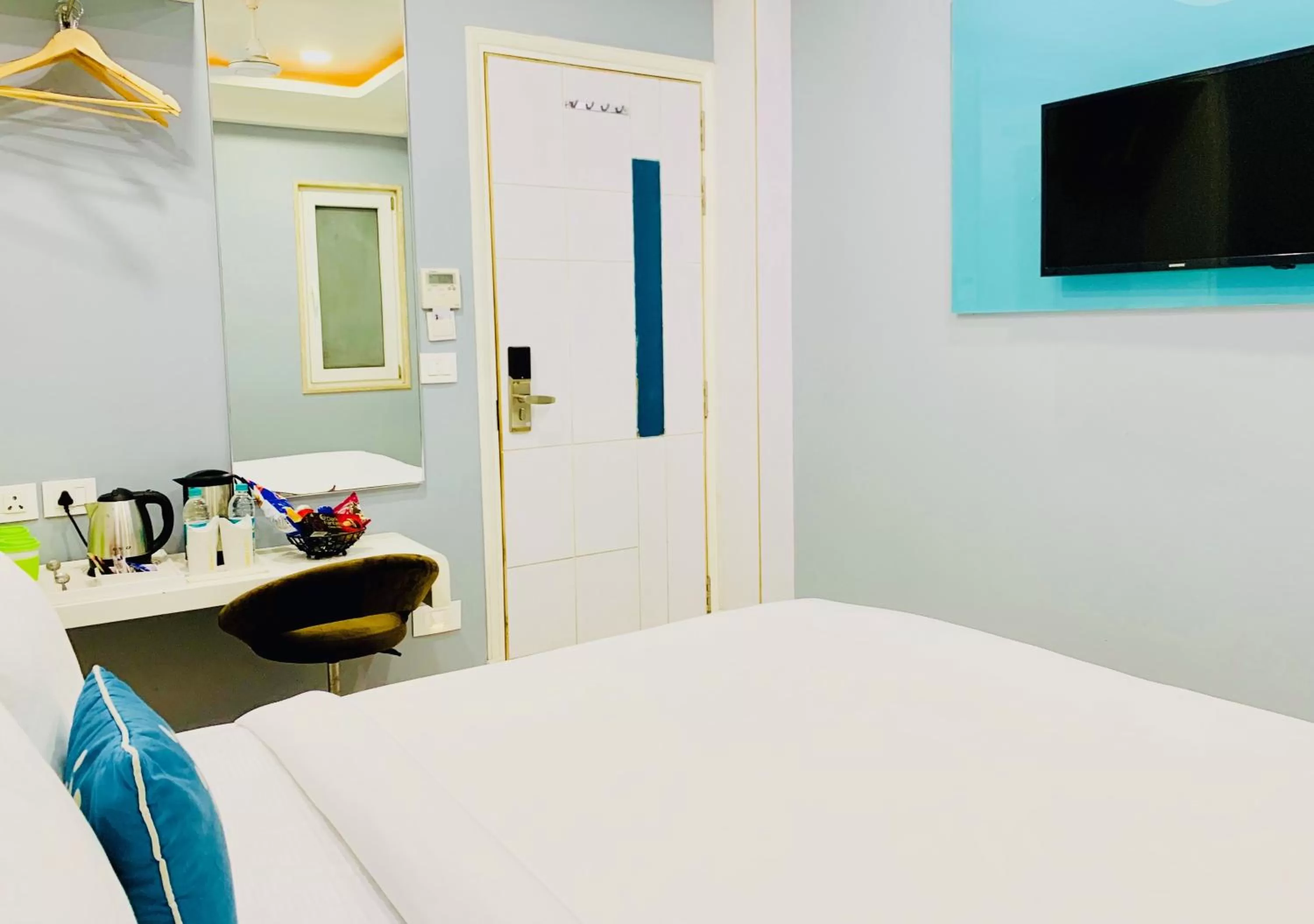 Photo of the whole room, Bed in City Empire - New Delhi Railway Station, Near Connaught Place