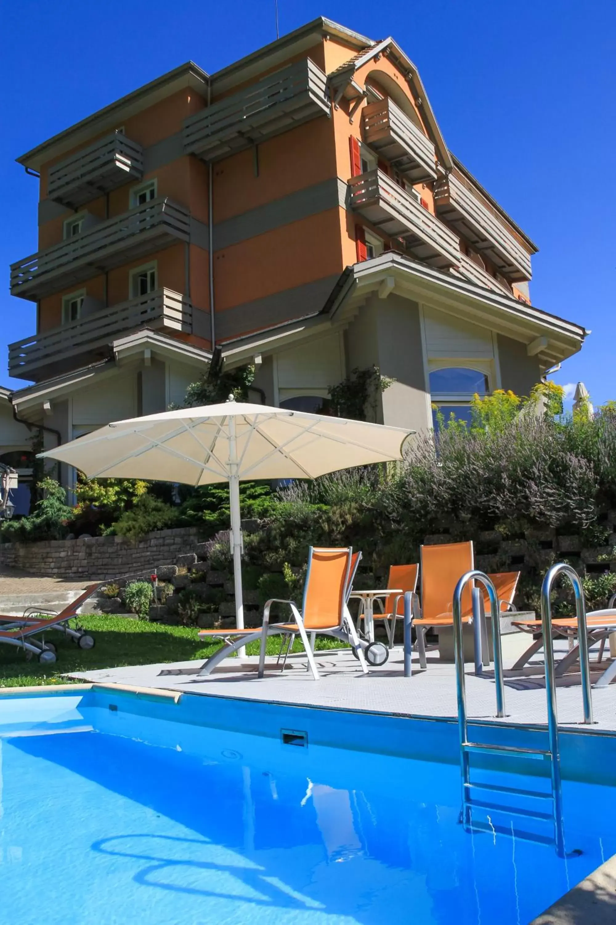 Property building, Swimming Pool in Hotel Berghof Amaranth