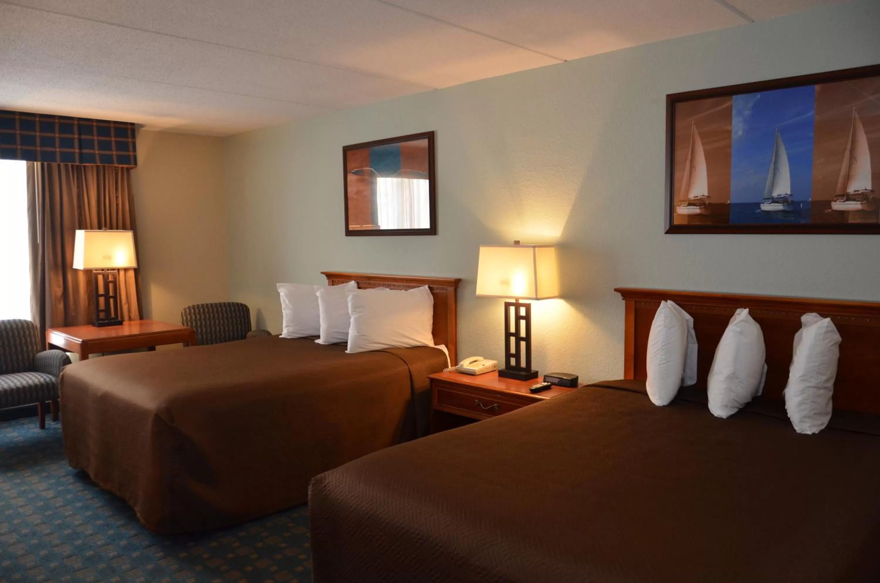 Bed in Tawas Bay Beach Resort & Conference Center