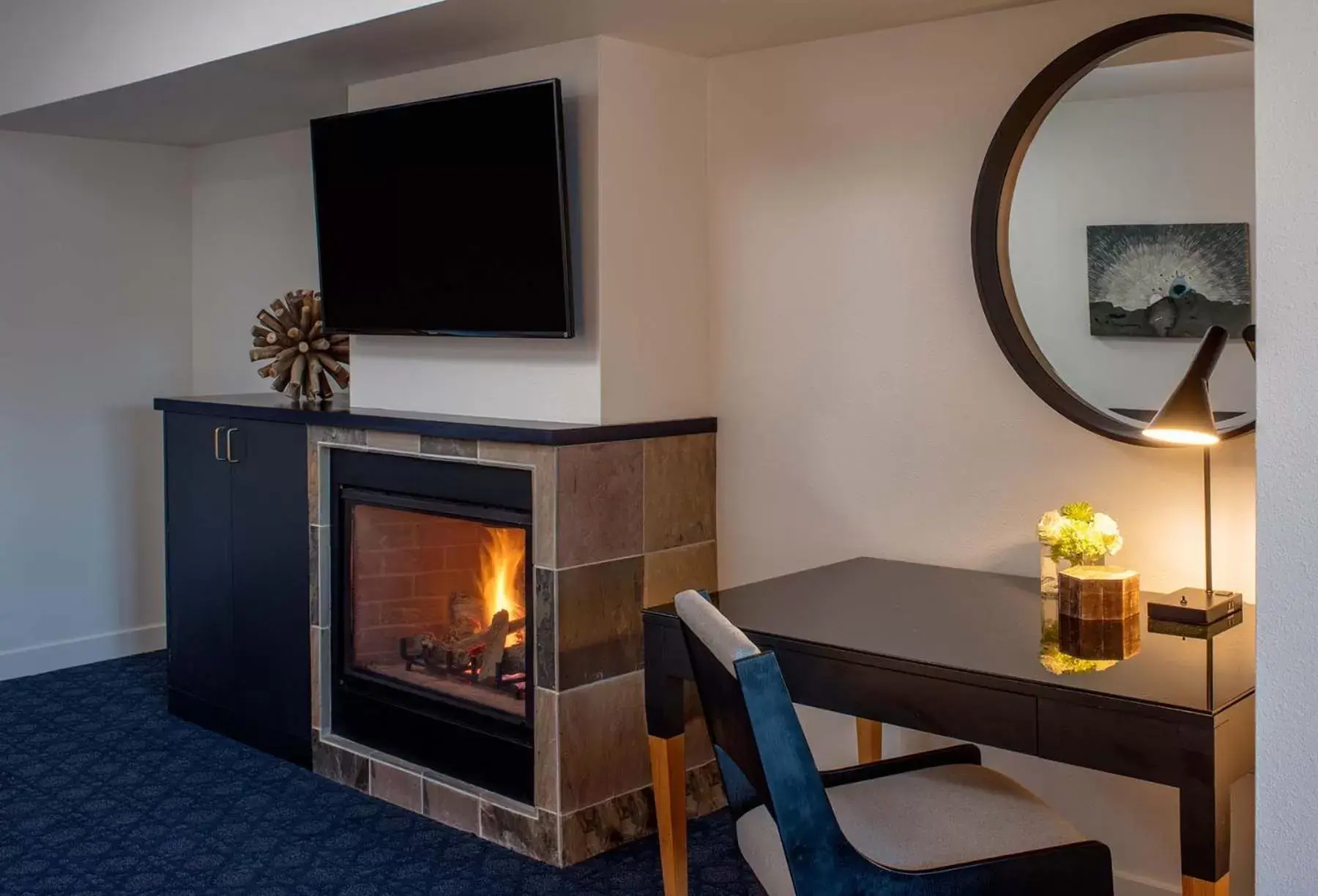 Living room, TV/Entertainment Center in River's Edge Hotel Portland, Tapestry Collection by Hilton