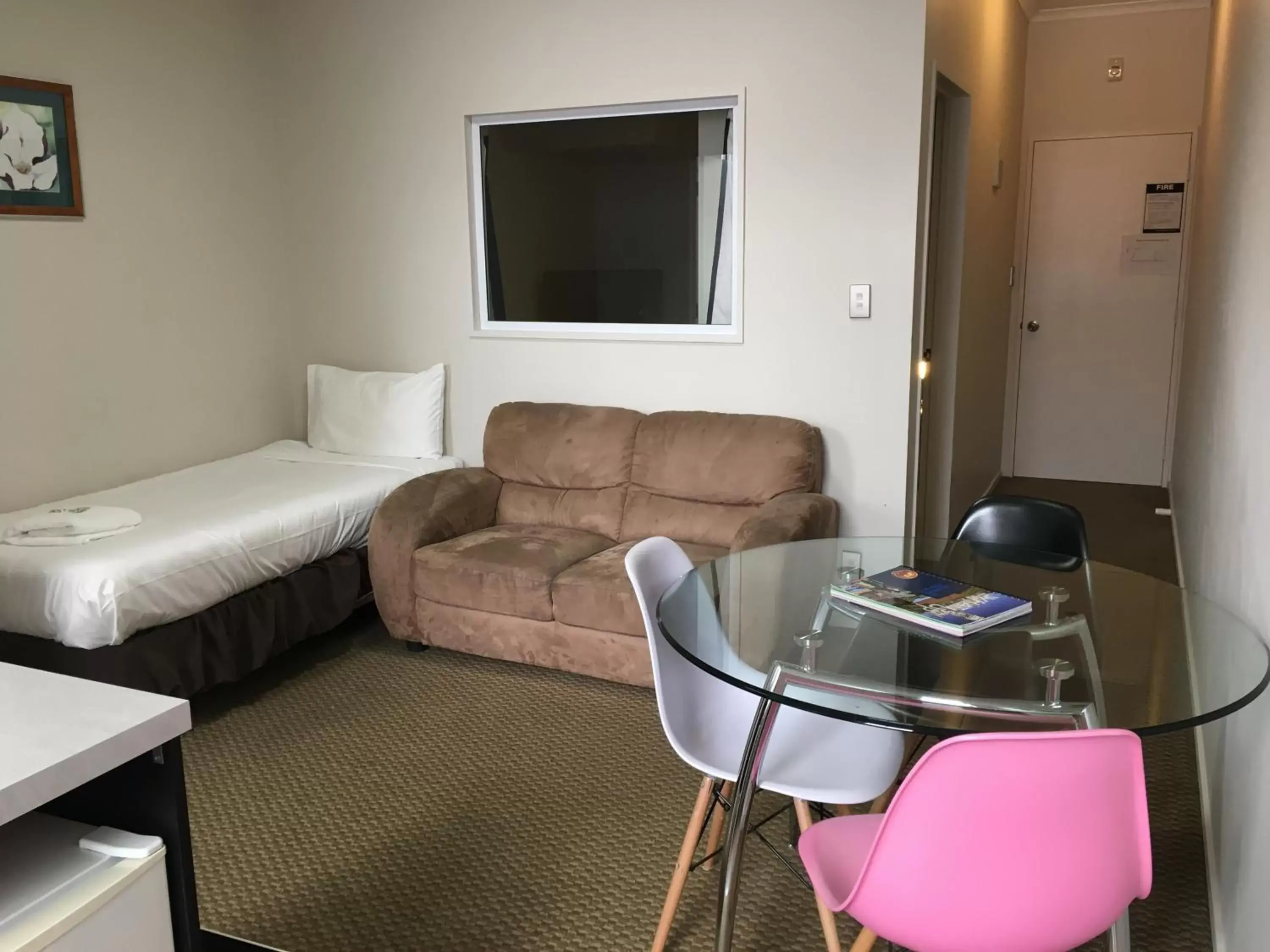 Bed, TV/Entertainment Center in Motel on Carroll