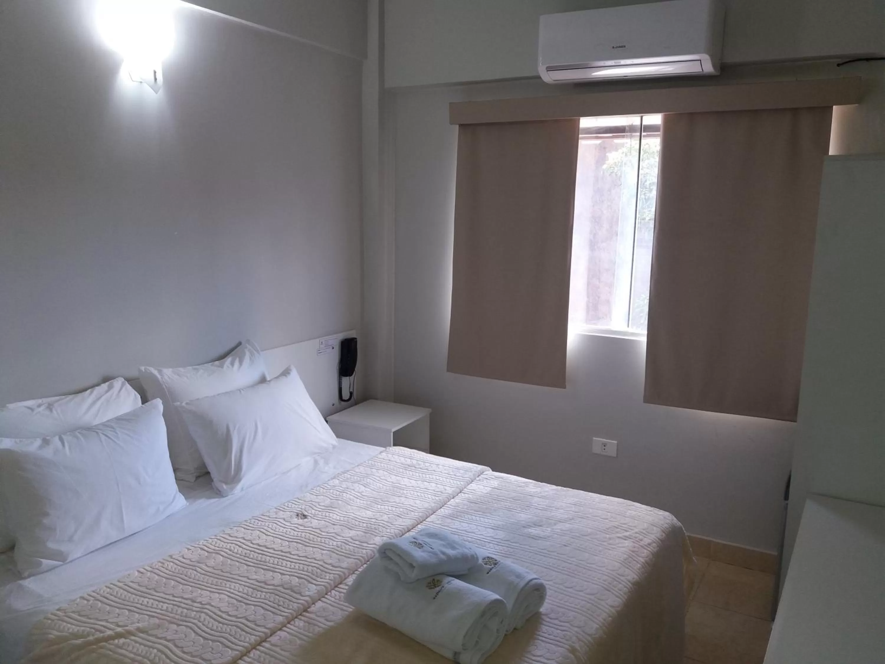 Bed in Madame Lynch Hotel Asuncion