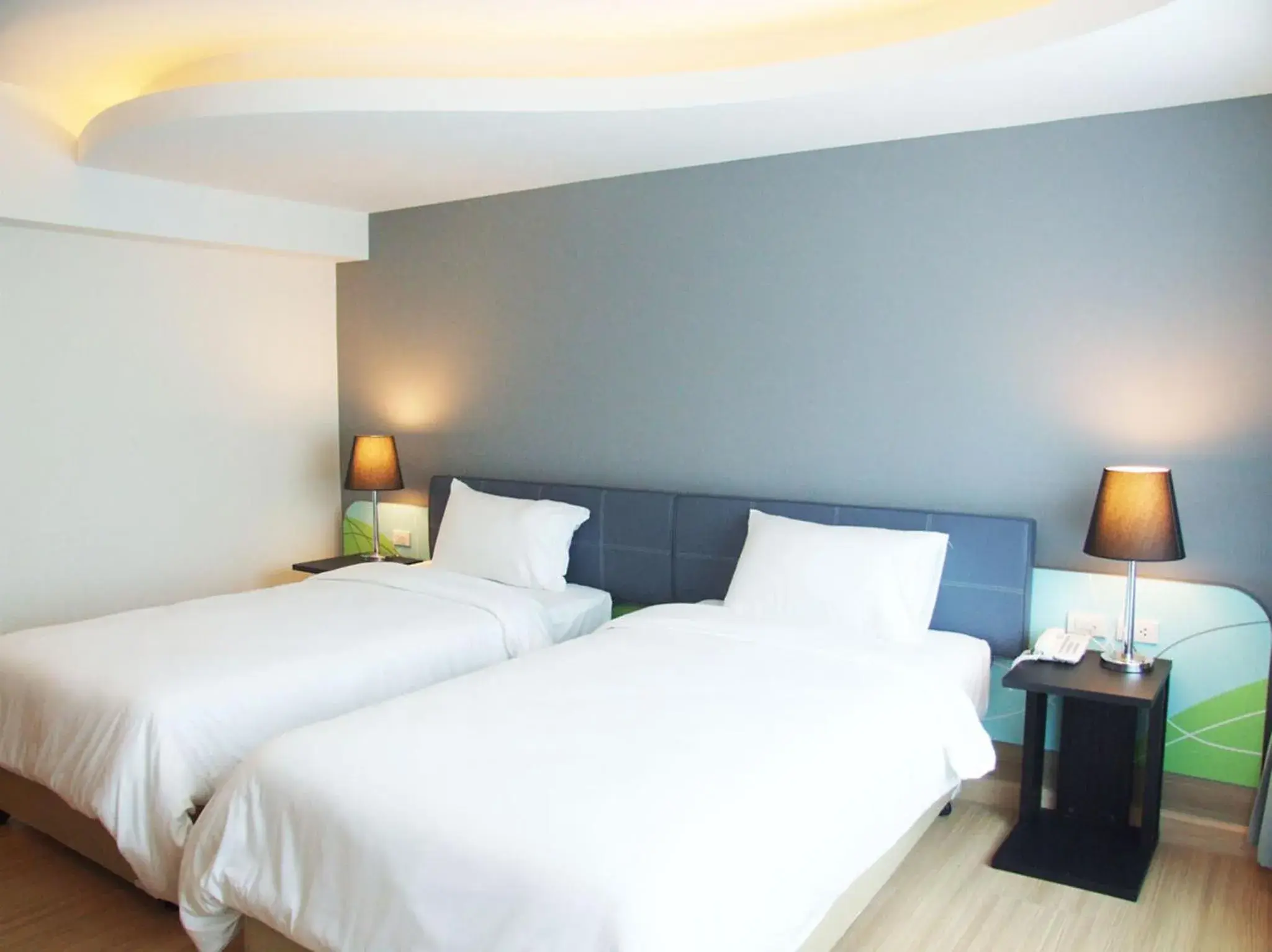 Bed in Grand Tower Inn Sathorn Hotel - SHA Plus