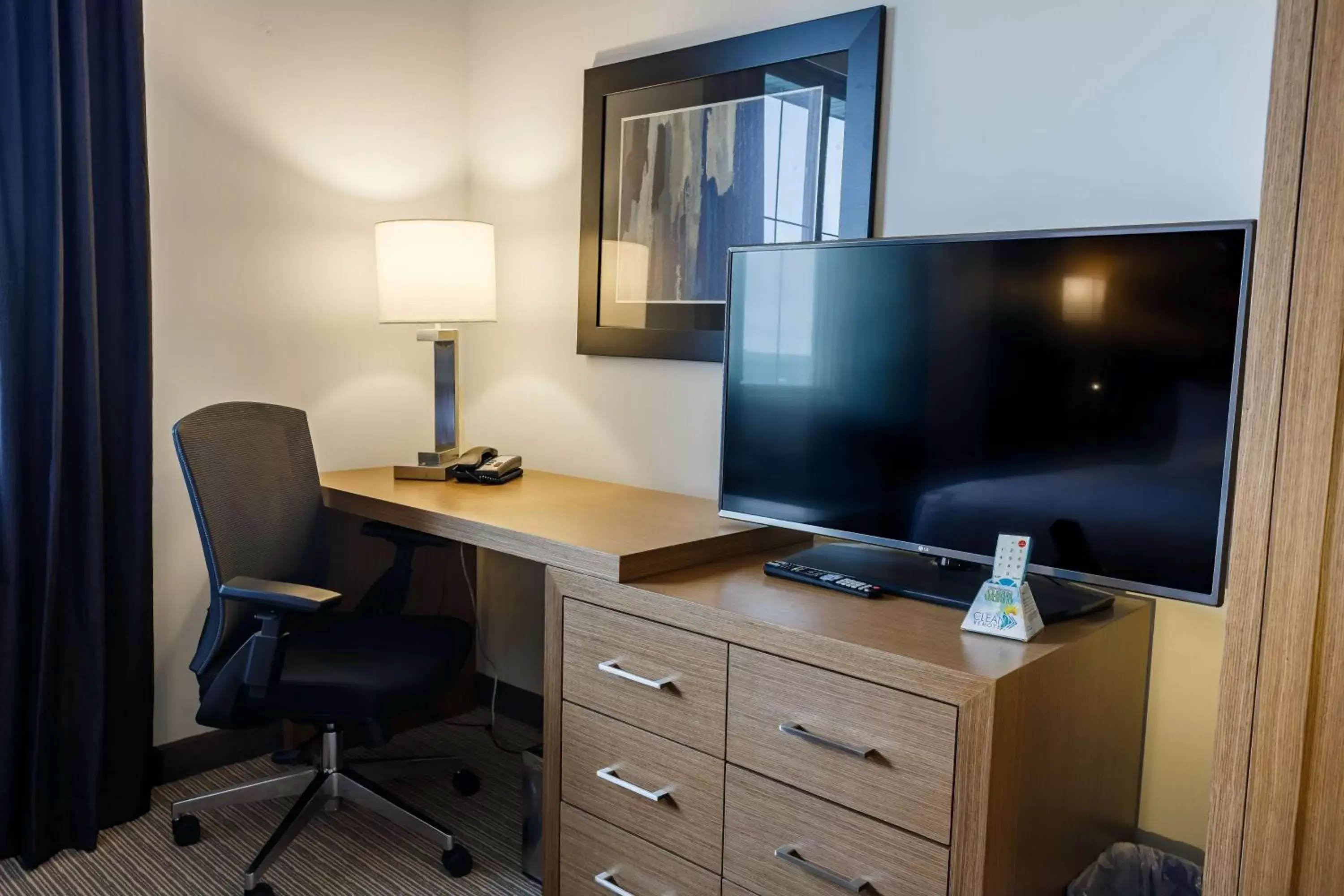 Photo of the whole room, TV/Entertainment Center in Executive Residency by Best Western Calgary City View North